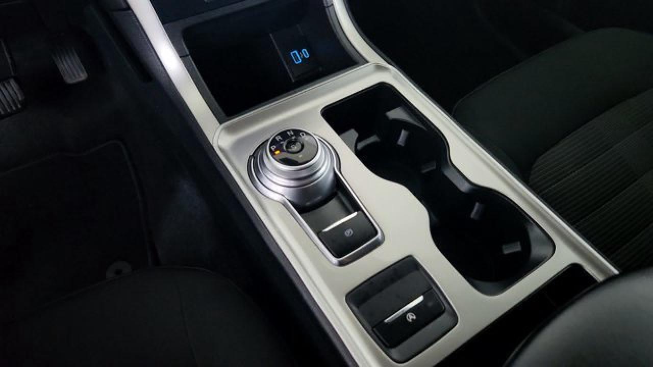 12990943