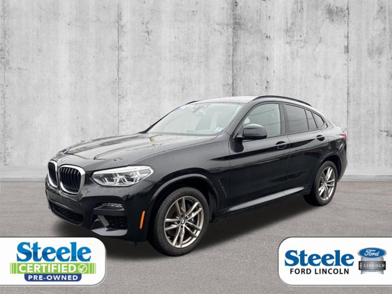 2021 BMW X4 xDrive30iAWD | Sporty Coupe Design | Premium LuxuryStand out from the crowd with this 2021 BMW X4 xDrive30i a perfect combination of sporty performance and luxury SUV practicality, wrapped in a sleek coupe-style design.With its bold stance, sloping roofline, and signature BMW styling, the X4 delivers a powerful road presence unlike a traditional SUV.Performance & Driving ExperiencePowered by a 2.0L TwinPower Turbo engine paired with an 8-speed automatic transmission and BMWs xDrive All-Wheel Drive system.Smooth yet powerful accelerationPrecise handling with a sporty feelConfident control in all weather conditionsWhether in the city or on the highway, this X4 delivers a dynamic and engaging drive.Interior & ComfortStep inside a refined and driver-focused cabin:Premium leather seating surfacesHeated front seatsPower-adjustable seats with memoryDual-zone climate controlSpacious cabin with a sporty cockpit feelThe coupe-style design still offers practical space with a premium touch throughout.Technology FeaturesStay connected with modern BMW tech:Large infotainment display with iDrive systemApple CarPlay & Android AutoNavigation systemBluetooth connectivityPremium sound systemSafety & Driver AssistanceDrive with confidence thanks to advanced safety features:Blind spot monitoringLane departure warningForward collision warning with braking assistParking sensors with rearview cameraStability and traction control systemsEfficiencyBalanced performance with reasonable fuel economy for its class, making it ideal for both daily use and long drives.Why Choose This X4?Unique coupe-SUV stylingSporty driving dynamicsPremium German luxury feelPerfect alternative to traditional SUVs if you want something more stylish and fun to drive.Perfect For:Drivers who want sporty luxuryProfessionals looking for a stylish daily driverAnyone wanting a standout SUVCall to ActionRare combination of style and performance wont last longContact us today to book your test drive!Bold Design. Sporty Drive. 2021 BMW X4 xDrive30iAwards:* JD Power Canada Automotive Performance, Execution and Layout (APEAL) Study, Initial Quality Study (IQS) * JD Power Canada Initial Quality Study (IQS)ALL CREDIT APPLICATIONS ACCEPTED! ESTABLISH OR REBUILD YOUR CREDIT HERE. APPLY AT https://steeleadvantagefinancing.com/6198 We know that you have high expectations in your car search in Halifax. So if youre in the market for a pre-owned vehicle that undergoes our exclusive inspection protocol, stop by Steele Ford Lincoln. Were confident we have the right vehicle for you. Here at Steele Ford Lincoln, we enjoy the challenge of meeting and exceeding customer expectations in all things automotive.