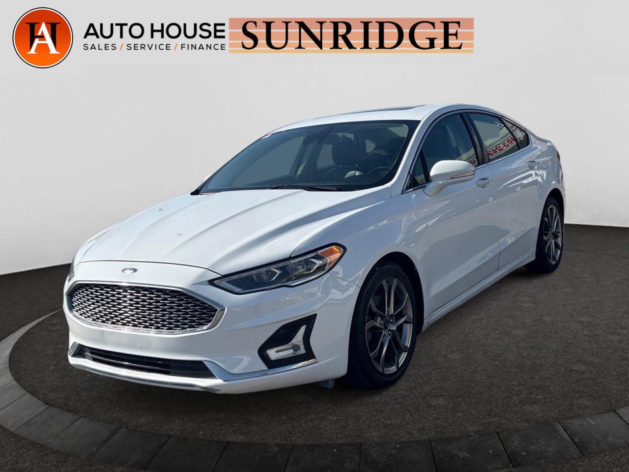 Used 2020 Ford Fusion Hybrid Titanium LEATHER HYBRID SUNROOF NAVIGATION BLIND SPOT DETECTION LANE ASSIST for sale in Calgary, AB