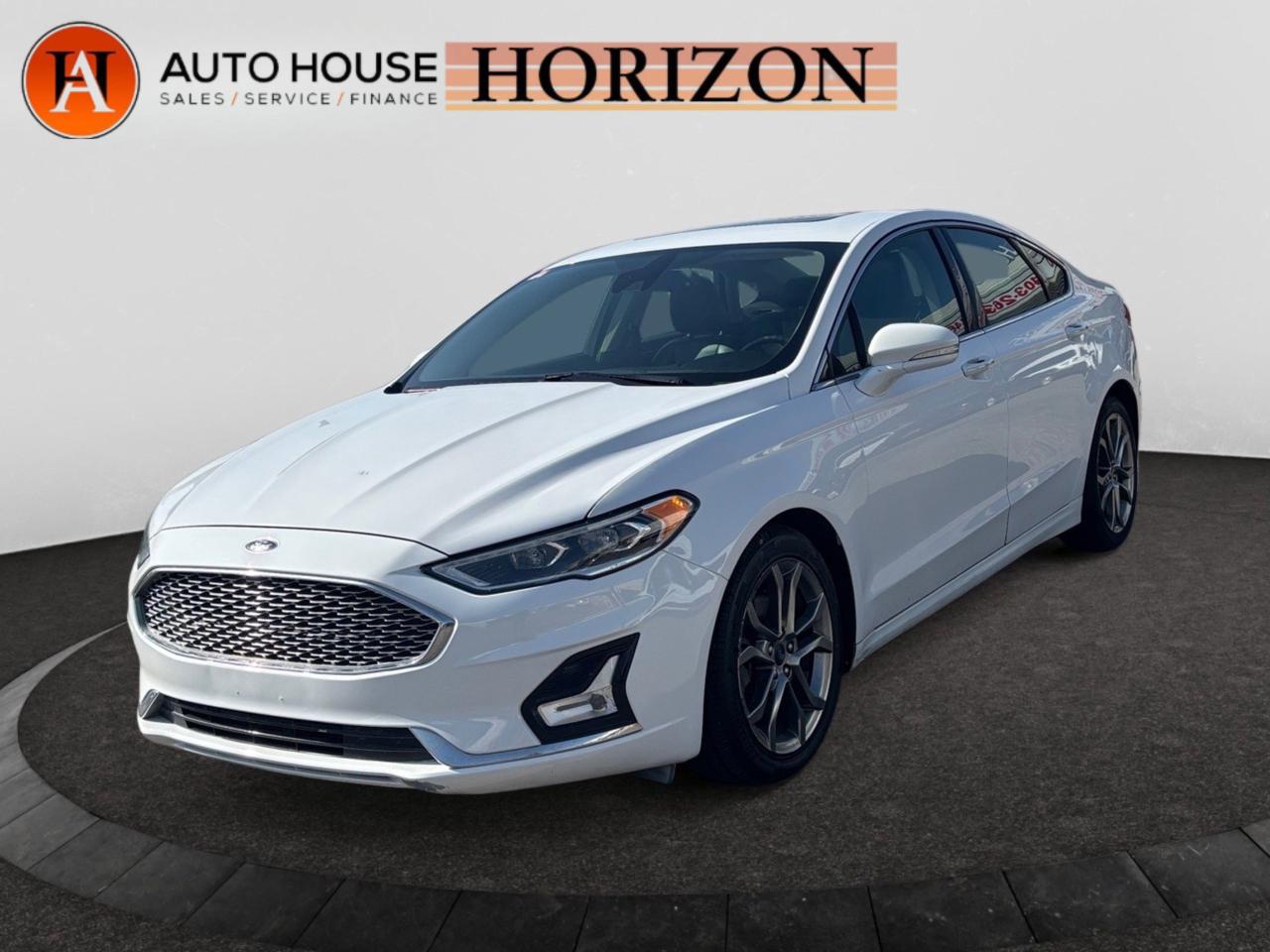 Used 2020 Ford Fusion Hybrid Titanium LEATHER HYBRID SUNROOF NAVIGATION BLIND SPOT DETECTION LANE ASSIST for sale in Calgary, AB
