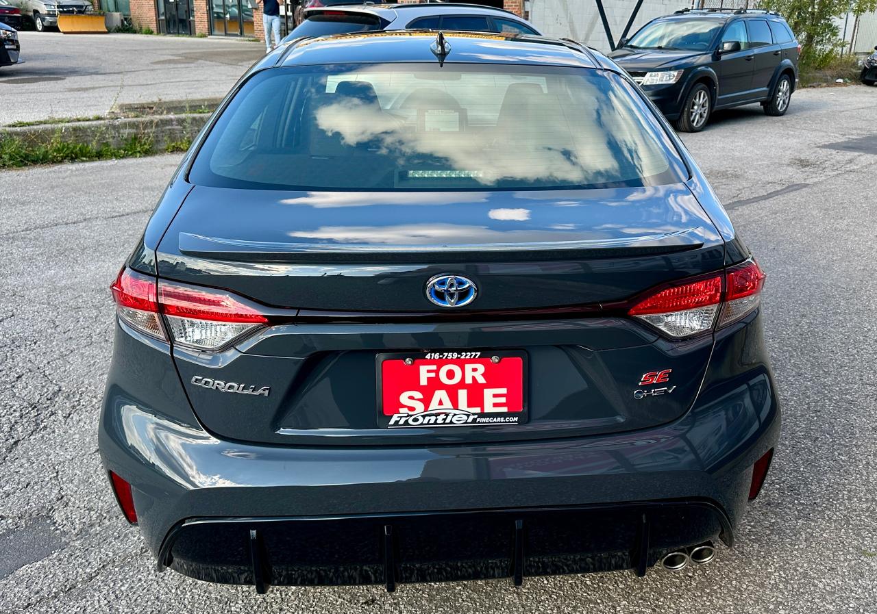 2025 Toyota Corolla Hybrid SE | NO ACCIDENTS | AWD | SUNROOF | LOW KMS Photo