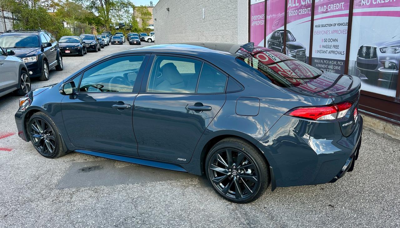 2025 Toyota Corolla Hybrid SE | NO ACCIDENTS | AWD | SUNROOF | LOW KMS Photo