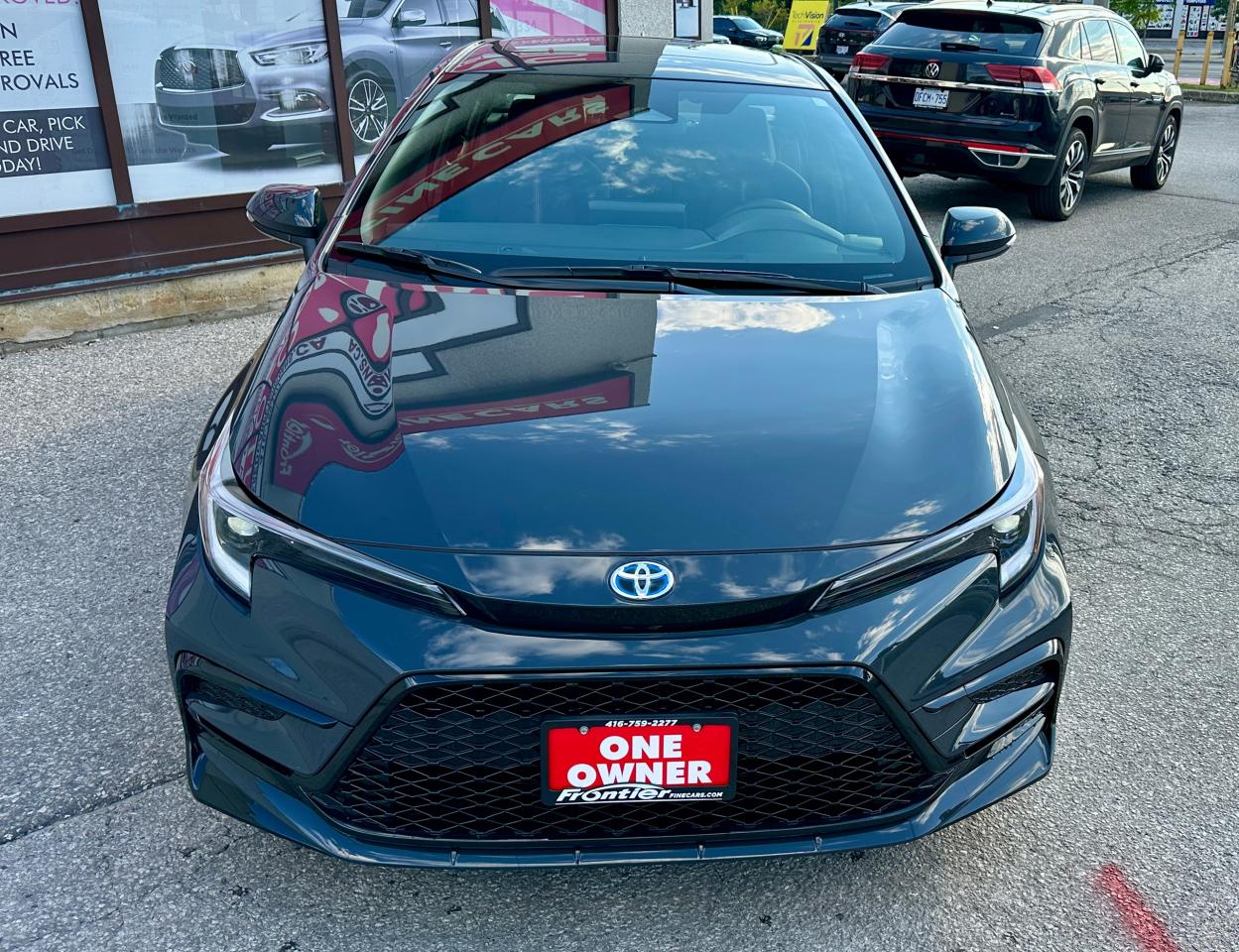 2025 Toyota Corolla Hybrid SE | NO ACCIDENTS | AWD | SUNROOF | LOW KMS Photo