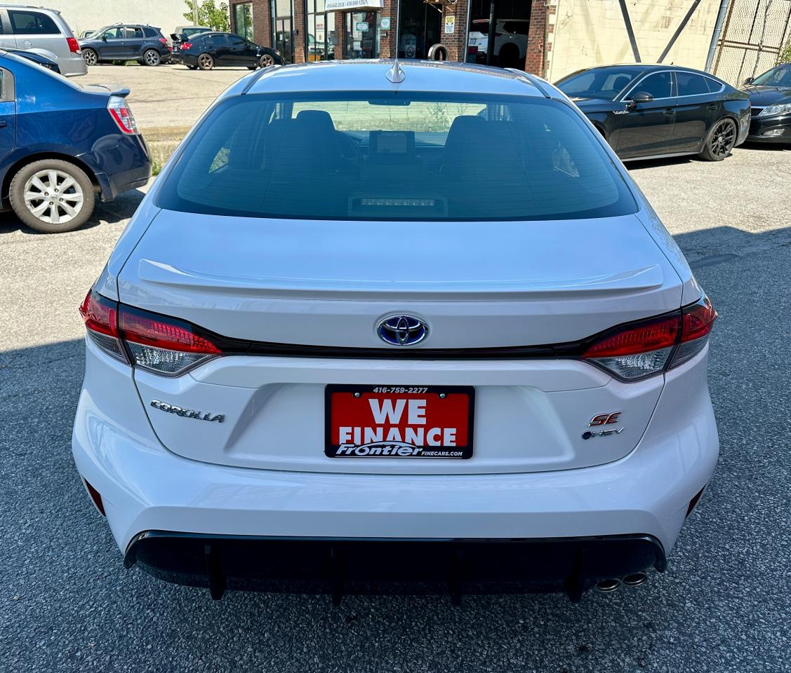 2025 Toyota Corolla Hybrid SE | NO ACCIDENTS | SUNROOF | AWD | LOW KMS Photo