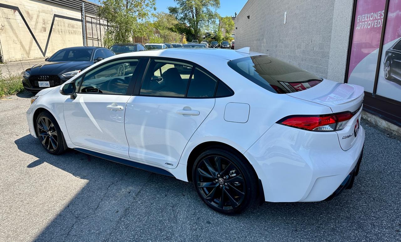 2025 Toyota Corolla Hybrid SE | NO ACCIDENTS | SUNROOF | AWD | LOW KMS Photo