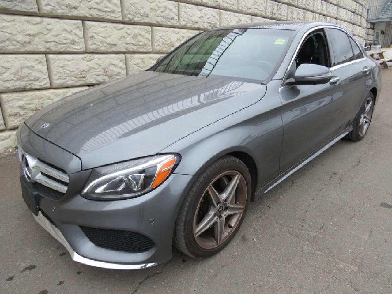 Recent Arrival!CARFAX Canada No Reported AccidentsGray 2018 Mercedes-Benz C-Class C 300 4MATIC® 4MATIC® 9-Speed Automatic 2.0L I4 DOHC Turbocharged4MATIC®, 4-Wheel Disc Brakes, 8 Speakers, 8-Way Power Adjustable Front Driver Seat, 8-Way Power Adjustable Front Passenger Seat, ABS brakes, Air Conditioning, Alloy wheels, AM/FM radio, ARTICO Upholstery, Auto tilt-away steering wheel, Auto-dimming door mirrors, Auto-dimming Rear-View mirror, Automatic temperature control, Brake assist, Bumpers: body-colour, CD player, Child-Seat-Sensing Airbag, Delay-off headlights, Driver door bin, Driver vanity mirror, Dual front impact airbags, Dual front side impact airbags, Electronic Stability Control, Exterior Parking Camera Rear, Four wheel independent suspension, Front anti-roll bar, Front Bucket Seats, Front dual zone A/C, Front reading lights, Fully automatic headlights, Head restraints memory, Heated door mirrors, Heated Front Bucket Seats, Heated front seats, Illuminated entry, Knee airbag, Low tire pressure warning, Memory seat, Occupant sensing airbag, Outside temperature display, Overhead airbag, Overhead console, Panic alarm, Passenger door bin, Passenger vanity mirror, Power adjustable front head restraints, Power door mirrors, Power driver seat, Power moonroof, Power passenger seat, Power steering, Power windows, Premium audio system: COMAND, Radio data system, Radio: Audio 20 w/Single CD & Bluetooth, Rain sensing wipers, Rear anti-roll bar, Rear fog lights, Rear reading lights, Rear window defroster, Remote keyless entry, Security system, Speed control, Speed-sensing steering, Split folding rear seat, Steering wheel memory, Steering wheel mounted audio controls, Tachometer, Telescoping steering wheel, Tilt steering wheel, Traction control, Trip computer, Turn signal indicator mirrors, Variably intermittent wipers, Weather band radio, Wheels: 17 Twin 5-Spoke.Certification Program Details: 2 Years Fresh MVI Fully Detailed Full Tank of fuel Brale Through InspectionAt Steele GMC Buick Fredericton, were proud to be your Used Car Mega Center serving drivers all across Atlantic Canada from Fredericton, Oromocto, New Maryland, Woodstock, Saint John, and Moncton in New Brunswick, to Nova Scotia, Prince Edward Island, and Newfoundland. Our inventory features all makes and models of used cars, trucks, SUVs, and vans, giving you the best selection in the region. Whether you need a fuel-efficient sedan, a family SUV, or a rugged pickup, youll find it right here at Steele GMC Buick Fredericton. With our Market Value Pricing, every vehicle is priced based on real-time market conditions, ensuring you get the best possible deal without the hassle of negotiating. We keep pricing transparent and competitive so you can shop with total confidence. No matter your credit situation good, bad, or no credit at all youre approved. Our finance experts work with lenders across Atlantic Canada to find the best terms for your budget, including second-chance financing, newcomer programs, and credit rebuilding solutions. As part of Steele Auto Group, Atlantic Canadas most diversified automotive group with 47 dealerships representing 27 brands, we offer unmatched selection, buying power, and customer support. That means if the vehicle you want isnt on our Fredericton lot, we can source it quickly from our massive dealer network across the Maritimes. When it comes to used vehicles, Steele GMC Buick Fredericton is the destination for drivers all across Atlantic Canada delivering market value pricing, every make and model, and guaranteed credit approval so you can get on the road with confidence.Steele Auto Group is the most diversified group of automobile dealerships in Atlantic Canada, with 47 dealerships selling 27 brands and an employee base of well over 2300.Reviews:* Unique styling, an upscale cabin, a firm, quality feel, and pleasing performance and effic