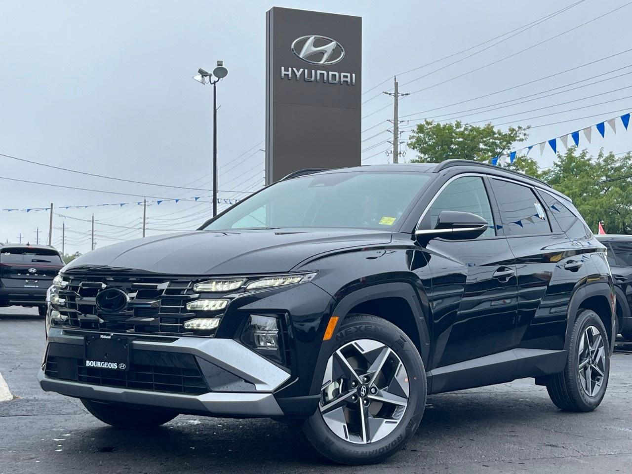 <p>The 2026 Hyundai Tucson Preferred in Black with AWD and a robust 2.5L 4-cyl engine perfectly blends power and poise. Designed to adapt to any terrain effortlessly, it promises a confident driving experience on winding roads or city streets alike.</p><p>Command attention with its sleek Black exterior that hosts stylish alloy wheels and a seamlessly integrated sunroof/moonroof, making every journey an experience in elegance. Step inside to a refined Black interior featuring heated front seats and a leather-wrapped heated steering wheel, ensuring comfort in any season.</p><p>Equipped with the latest in automotive technology, the Tucson keeps you connected through a smart device integration system and entertained with satellite radio. The enhanced safety offerings like a backup camera, brake assist, and lane assist provide both security and peace of mind. Adaptive cruise control brings an extra layer of ease to long drives, while remote start and keyless entry ensure convenience at your fingertips.</p><p>Ideal for families and adventure enthusiasts seeking reliability packed with advanced features, the 2026 Hyundai Tucson Preferred stands ready to elevate your driving experience. Contact our dealership today for more information and to schedule a test drive in this outstanding SUV.</p> <p><strong>Advertised Cash Purchase Price</strong> includes a $500 loyalty offer for eligible buyers. See dealer for complete details. Offer ends Jan 2, 2026. </p> <p><strong>Why Choose the Bourgeois Auto Group?</strong></p><p>For 80 years, Bourgeois Auto Group has been delivering exceptional automotive experiences. Our factor trained teams work to ensure you receive the shopping experience you deserve; whether you're looking for a new or new-to-you vehicle.</p><p>Shop 24/7 with our online showroom and chat service, ensuring convenience every step of the way. No hidden fees, full disclosure, and every pre-owned vehicle comes with a Carfax® report for peace of mind.</p><p>We offer a wide selection of pre-owned vehicles, all competitively priced using real-time market data. Get the best deal on your purchase and trade-in with our free Live Market Analysis report.</p><p>Looking to sell your car? We buy any make or modelno purchase required. Our simple to use online trade valuation tool will provide you with a clear, transparent selling experience whether you buy our car or not.</p><p>Backed by hundreds dedicated employees across 4 convenient locations, were here to meet all your automotive needs. Visit us in Midland or Parry Sound and explore our inventory or schedule your next service today.</p> <p><strong>Financing Your Next Vehicle with Bourgeois Midland Hyundai:</strong></p><p>At Bourgeois Midland Hyundai, we make financing your next vehicle simple and stress-free! Our team works with trusted lenders to find flexible options tailored to your budget. Drive away with confidenceapply today!</p><p>Take advantage of our online pre-qualification tool, backed by Equifax and TD Bank to find the payment that works for you. Simply <a href=https://www.bourgeoishyundai.com/pre-qualify-for-financing/ rel=nofollow><strong>CLICK HERE</strong></a> to use our secure online credit tool with no impact to your credit. </p>