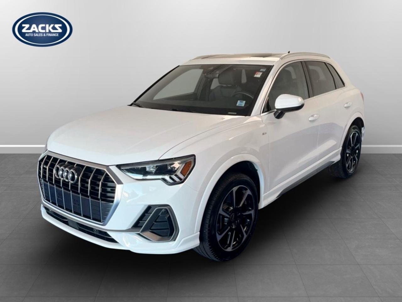New Price! 2024 Audi Q3 2.0 Progressiv quattro Certified. 8-Speed Automatic with Tiptronic quattro Glacier White Metallic 2.0L 4-Cylinder TFSI<br />Odometer is 4367 kilometers below market average!<br /><br />Air Conditioning, AM/FM radio: SiriusXM, Audi smartphone interface (Apple CarPlay/Android Auto), Automatic temperature control, Exterior Parking Camera Rear, Front Bucket Seats, Heated front seats, Heated Front Sport Bucket Seats, Heated steering wheel, Leather Seating Surfaces, Leather Shift Knob, Leather steering wheel, Navigation System, Power driver seat, Power Liftgate, Power moonroof: Panoramic, Power steering, Power windows, Radio: MMI Radio Plus w/SiriusXM Satellite, Rain sensing wipers, Remote keyless entry, Telescoping steering wheel, Tilt steering wheel, Turn signal indicator mirrors, Wheels: 8.5J x 19''' 7-Spoke Rotor Design.<br /><br />Certification Program Details: Fresh 2 Yr MVI | 30 day warranty* | 110 point inspection | Full tank of fuel | Krown rustproofed | Flexible financing options | Professionally detailed<br /><br />This vehicle is Zacks Certified! You're approved! We work with you. Together we'll find a solution that makes sense for your individual situation. Please visit us or call 902 843-3900 to learn about our great selection.<br /><br />With 22 lenders available Zack's Auto Sales can offer our customers with the lowest available interest rate. Thank you for taking the time to check out our selection!