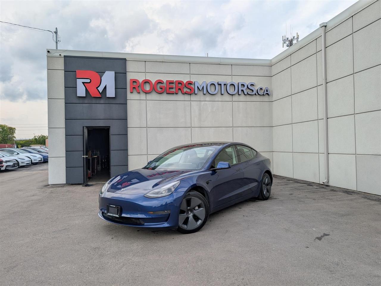 Photo of Blue 2021 Tesla Model 3