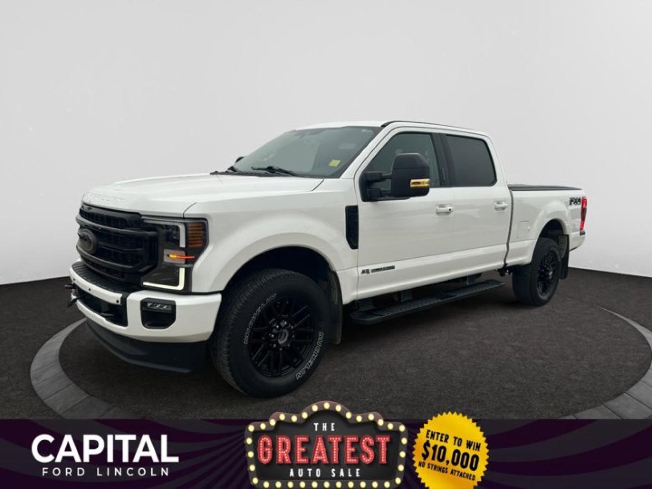 Looking for towing power and a truck that packs a punch? This WHITE Ford Super Duty pickups offer a pair of stout engines and can tow bumper-pull trailers that weigh up to 18,500 pounds or 24,700 with a fifth-wheel setup. The tough exterior is backed up by a cab that is attractive, functional and comfortable. The Super Duty Lariat adds polished aluminum 17-inch wheels for F-350 dually and bright 18-inch aluminum, heated leather power front seats with console, dual-zone climate control, power-adjust pedals, rear camera, SYNC MyFord Touch, leather-wrapped wheel, wood grain trim, power fold-and-telescoping tow mirrors, illuminated visor mirrors, privacy glass, keypad door entry, 110-volt outlet and a powered sliding rear window with defrost. Choose a truck you can trust! Come in today to speak to a Capital Product Specialist about making this baby yours!Check out this vehicles pictures, features, options and specs, and let us know if you have any questions. Helping find the perfect vehicle FOR YOU is our only priority.P.S...Sometimes texting is easier. Text (or call) 306-994-3121 for fast answers at your fingertips!Dealer License #307287