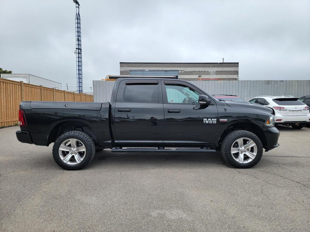 2017 RAM 1500 4WD Crew Cab 140.5" Sport - Photo #4
