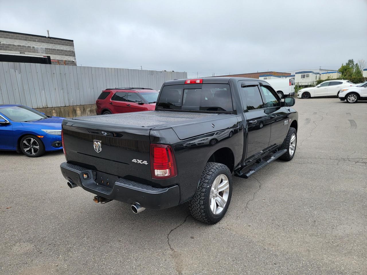 2017 RAM 1500 4WD Crew Cab 140.5" Sport - Photo #5