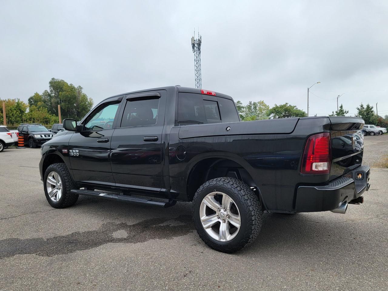 2017 RAM 1500 4WD Crew Cab 140.5" Sport - Photo #8