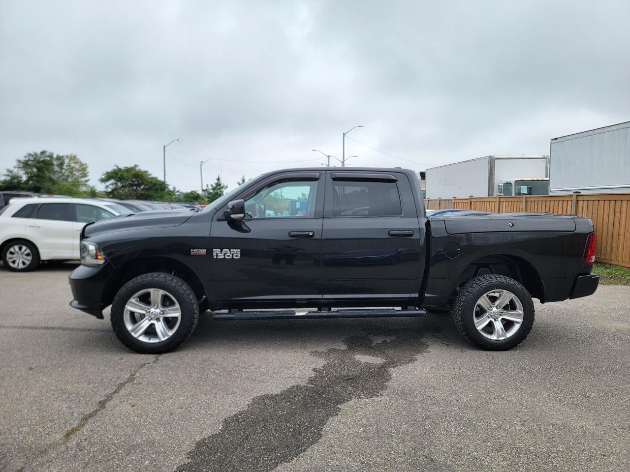 2017 RAM 1500 4WD Crew Cab 140.5" Sport - Photo #9
