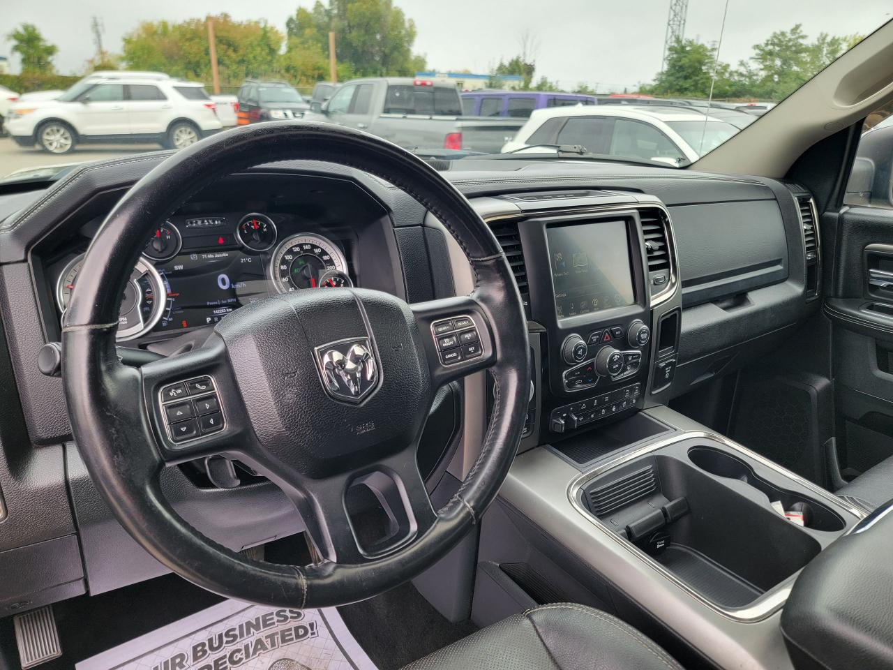 2017 RAM 1500 4WD Crew Cab 140.5" Sport - Photo #11