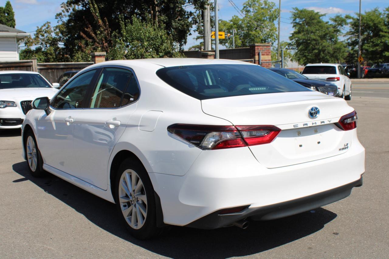 2024 Toyota Camry HYBRID LE Auto Photo2