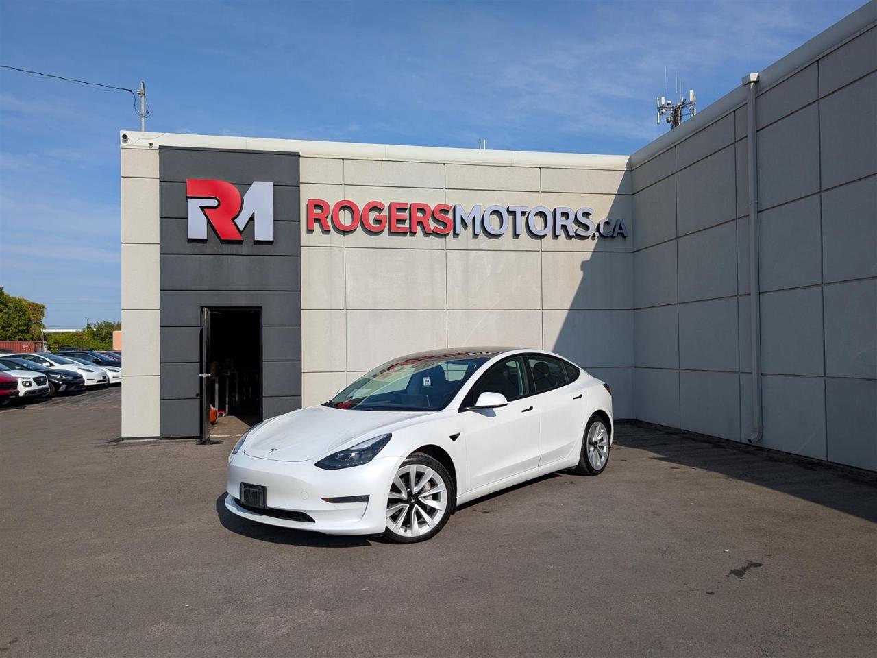 Photo of White 2021 Tesla Model 3