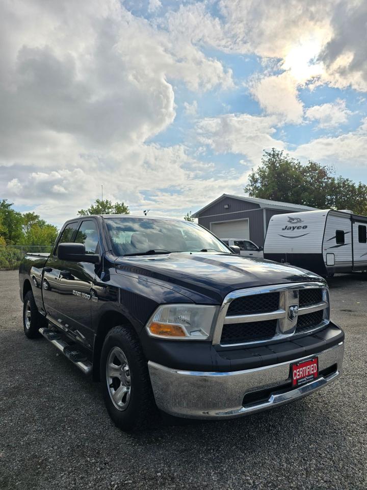 Used 2012 RAM 1500 4WD QUAD CAB 140.5
