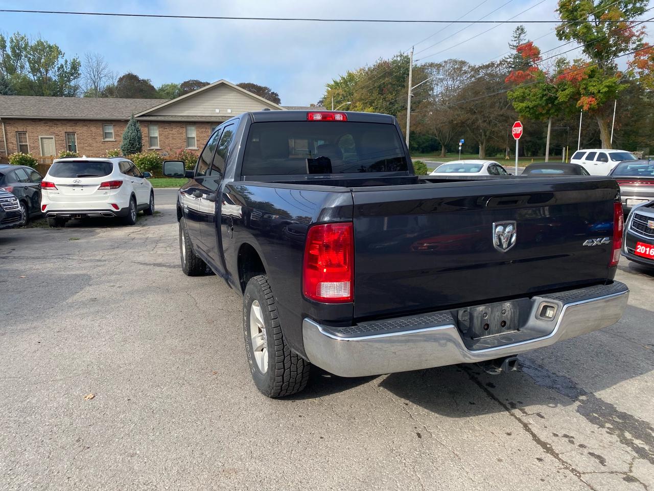 2015 RAM 1500 4WD QUAD CAB 140.5" ST - Photo #5