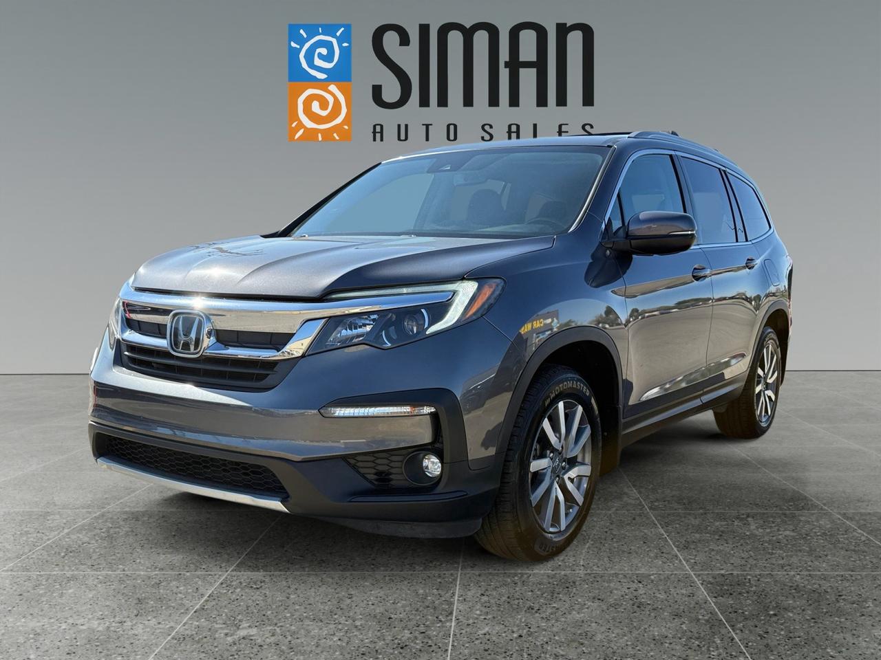## Drive Home Confidence: 2019 Honda Pilot EX - Ready for Your Family Adventures!

**Siman Auto Sales: Large Enough to Make a Difference, Small Enough to Care.** Serving Saskatchewan for over 26 years!

**Unleash the Legendary Reliability and Value of Honda with this Exceptional 2019 Pilot EX!**

Tired of worrying about your next vehicle? This Pilot is the perfect blend of rugged capability, family comfort, and peace of mind.

### **Key Features & Highlights:**

* **Year/Model:** 2019 Honda Pilot EX
* **Mileage:** 125,300 km (Ready for many more adventures!)
* **Peace of Mind:**
    * **Immaculate History:** Carfax reports **NO serious collisions**.
    * **Pristine Maintenance:** Excellent service records guarantee its care.
    * **Dealership Certified:** Just completed a full pre-sale inspection and a fresh full synthetic oil service.
    * **Honda Reliability:** Benefit from Hondas **legendary reliability** and outstanding **resale value**a smart investment for years to come.

### **Loaded with Comfort, Capability, and Cutting-Edge Tech:**

This Pilot is equipped to handle everything from the daily commute to weekend road trips:

* **Family Ready:** Spacious 3rd Row Seating for up to 8 passengers.
* **Comfort:** Power Heated Cloth Seats for those chilly mornings.
* **Connectivity:** Apple CarPlay and Bluetooth for seamless integration.
* **Convenience:** Command Start, Backup Camera, and HomeLink.
* **Safety & Assistance:**
    * Distance Pacing Cruise Control
    * Lane Keep Assist
    * Forward Collision Warning
* **Capability:**
    * Alloy Wheels
    * Trailer Tow Package (Ready for your toys!)

### **Your Financing & Ownership Solution is Here:**

* **Easy Financing:** Available on site through **16 banks and lenders**we make approval simple!
* **Trades Welcome:** Trades are encouragedlet us give you the best value for your current vehicle.
* **Warranty Options:** Aftermarket warranties available to fit **every need and budget**.

**We have over 70 quality vehicles to choose from! Check our reviews and see why customers trust Siman Auto Sales!**

**Dont miss this opportunity for a dependable, well-maintained, and fully equipped SUV. Call or visit Siman Auto Sales today to schedule your test drive!**