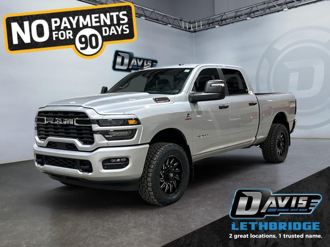 <b>5th Wheel Hitch Installed, Power Mirrors, ParkSense, Adaptive Cruise Control, Mobile Hotspot, Collision Mitigation!<br /> <br /></b><br /> <br /> <br />Experience heavy-duty power and versatility with the 2026 Ram 2500 Bighorn Crew Cab in Silver Zynith. Built for tough jobs, it features a 6.7L Cummins Turbo Diesel I6 engine, 8-speed TorqueFlite automatic transmission, and 4x4 drivetrain for exceptional towing and off-road capability.<br /><br />This Ram 2500 comes loaded with Big Horn Level 1 Plus equipment, including 40/20/40 cloth bench seating, rear 60/40 fold-flat seats, overhead console, Uconnect 5 NAV with 12 touchscreen, Apple CarPlay, Android Auto, Alexa built-in, and 9 Alpine speakers with subwoofer. Comfort and convenience are enhanced with dual-zone climate control, power-adjustable driver seat, folding flat-load floor storage, and keyless push-button start.<br /><br />Safety is uncompromised with adaptive cruise control with stop, ParkView rear camera, ParkSense front/rear assist, LED headlamps, trailer sway damping, anti-lock 4-wheel disc brakes, and advanced airbags. Rugged exterior features include heavy-duty suspension, Firestone all-season tires on 18 polished aluminum wheels, body-color grille and bumpers, tow hooks, Class V hitch, and MOPAR spray-in bedliner.<br /><br />Built for work or adventure, the 2026 Ram 2500 Bighorn blends power, technology, and comfort for any task.<br /> <br />To apply right now for financing use this link: <a href=https://www.bridgecitychrysler.com/pre-approval/ target=_blank rel=nofollow noopener noreferrer>https://www.bridgecitychrysler.com/pre-approval/</a><br /><br /> <br /><br />As a premier Chrysler, Dodge, Jeep and RAM dealership, Bridge City Chrysler proudly offers an extensive selection of new and used vehicles to meet every drivers needs. Customers across Lethbridge, Fort Macleod, Taber, Claresholm, Coaldale, and beyond trust us for daily vehicle specials, certified service and parts, and a seamless online inventory experience. <br /><br /> With competitive financing options and expert support, we make car buying easy and enjoyable. <br /><br /> Ready to hit the road? Schedule your test drive today at Bridge City Chrysler, your trusted Chrysler, Dodge, Jeep and RAM dealer in Lethbridge, Alberta.<br /><br /> Vehicle pricing offer shown expires 2026-01-31. <br /> Come by and check out our fleet of 80+ used cars and trucks and 120+ new cars and trucks for sale in Lethbridge. o~o