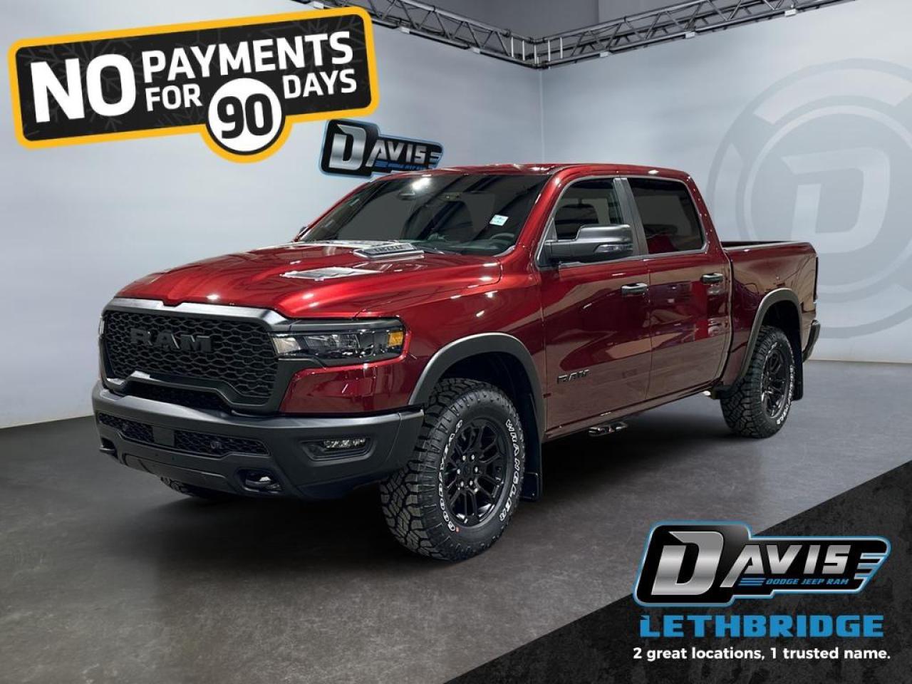 <b>Off-Road Suspension, Navigation, Apple CarPlay, Android Auto, Blind Spot Monitoring!<br /> <br /></b><br /> <br /> <br />The 2026 Ram 1500 Rebel in Delmonico Red Pearl Coat delivers bold off-road performance with a 3.0L I6 Hurricane Twin-Turbo engine paired to an 8-speed automatic transmission. This 4x4 crew cab features raised ride height, E-locker rear axle, off-road wheel flares, sport performance hood, dual exhaust with black tips, and black grille and bumpers, making it ready for any adventure.<br /><br />Inside, enjoy heated cloth/vinyl bucket seats, full-length upgraded floor console, 12 Uconnect 5 NAV touchscreen, Apple CarPlay, Android Auto, GPS navigation, and dual-zone climate control. The cabin includes power 8-way driver seat, rear 60/40 folding seats, premium overhead console, and multiple storage solutions for comfort and convenience.<br /><br />Safety features include Adaptive Cruise Control with Stop & Go, Blind Spot and Cross Path Detection, ParkView rear camera, Pedestrian Emergency Braking, and Active Lane Management. Additional amenities include remote start, 18 painted black wheels, Mopar rubber floor mats, and capless fuel fill for practicality and style.<br /> <br />To apply right now for financing use this link: <a href=https://www.bridgecitychrysler.com/pre-approval/ target=_blank rel=nofollow noopener noreferrer>https://www.bridgecitychrysler.com/pre-approval/</a><br /><br /> <br /><br />As a premier Chrysler, Dodge, Jeep and RAM dealership, Bridge City Chrysler proudly offers an extensive selection of new and used vehicles to meet every drivers needs. Customers across Lethbridge, Fort Macleod, Taber, Claresholm, Coaldale, and beyond trust us for daily vehicle specials, certified service and parts, and a seamless online inventory experience. <br /><br /> With competitive financing options and expert support, we make car buying easy and enjoyable. <br /><br /> Ready to hit the road? Schedule your test drive today at Bridge City Chrysler, your trusted Chrysler, Dodge, Jeep and RAM dealer in Lethbridge, Alberta.<br /><br /> Vehicle pricing offer shown expires 2026-01-31. <br /> Come by and check out our fleet of 80+ used cars and trucks and 120+ new cars and trucks for sale in Lethbridge. o~o