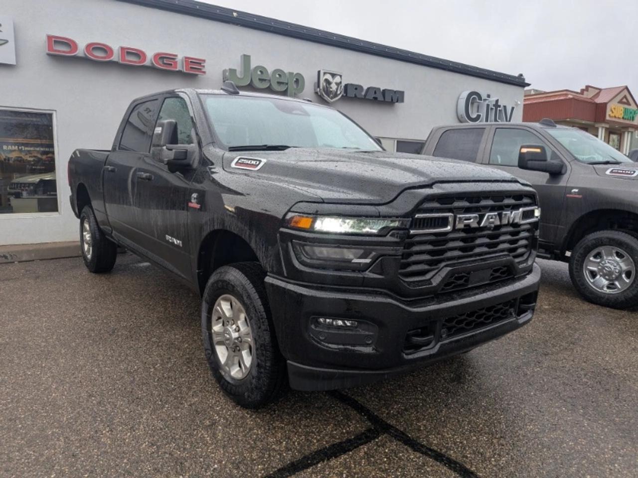 The 2026 RAM 2500 Big Horn is a durable and capable heavy-duty pickup designed to handle demanding work and rugged environments with ease. Equipped with a 6.7L Cummins turbo diesel engine producing 430 horsepower it offers exceptional towing and hauling performance. This 4WD truck features a crew cab with a short bed providing versatility for both job sites and weekend adventures. The Big Horn trim adds refined styling and useful features to enhance everyday driving comfort.**Specifications:****Make:** RAM**Model Year:** 2026**Model:** 2500**Trim:** Big Horn**Body Class:** Pickup**Drive Type:** 4WD/4-Wheel Drive/4x4**Engine:** 6.7L I6 Cummins Turbo Diesel**Engine Configuration:** In-Line**Engine Number of Cylinders:** 6**Fuel Type:** Diesel**Engine Power:** 430 hp**Cab Type:** Crew Cab**Bed Type:** Short**Rear Wheels:** Single Rear Wheel (SRW)**Brake System Type:** Hydraulic**Steering:** Left-Hand Drive (LHD)**Seat Belt Type:** Manual**GVWR:** Class 3: 10001 - 14000 lbServing Medicine Hat Alberta and nearby communities like Taber Lethbridge Brooks and Maple Creek Saskatchewan we uphold a legacy of excellence in every vehicle we sell. Our dealership sets the standard for Jeep Dodge Ram and Chrysler providing exceptional service and a commitment you can trust.