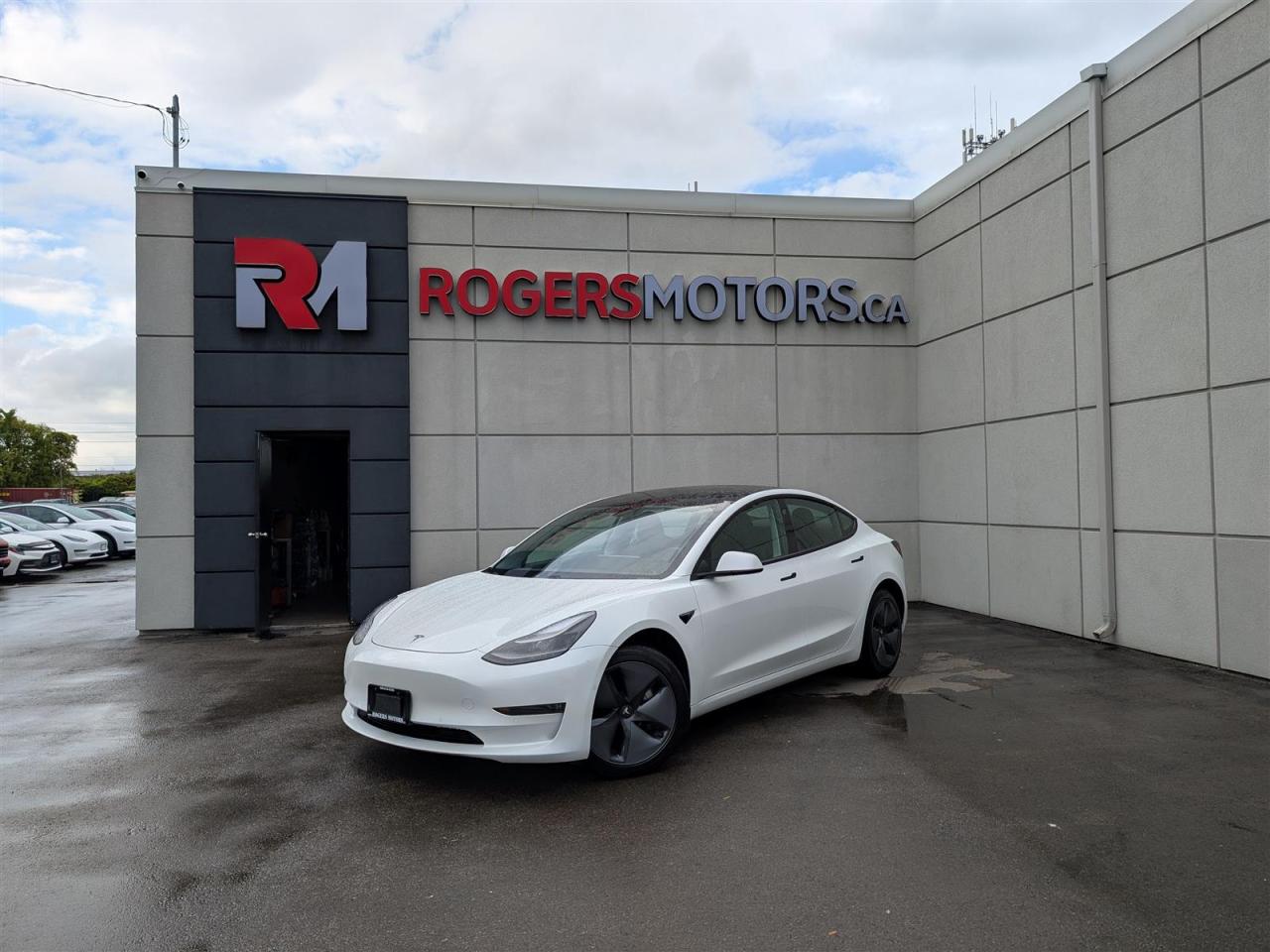 Photo of White 2021 Tesla Model 3
