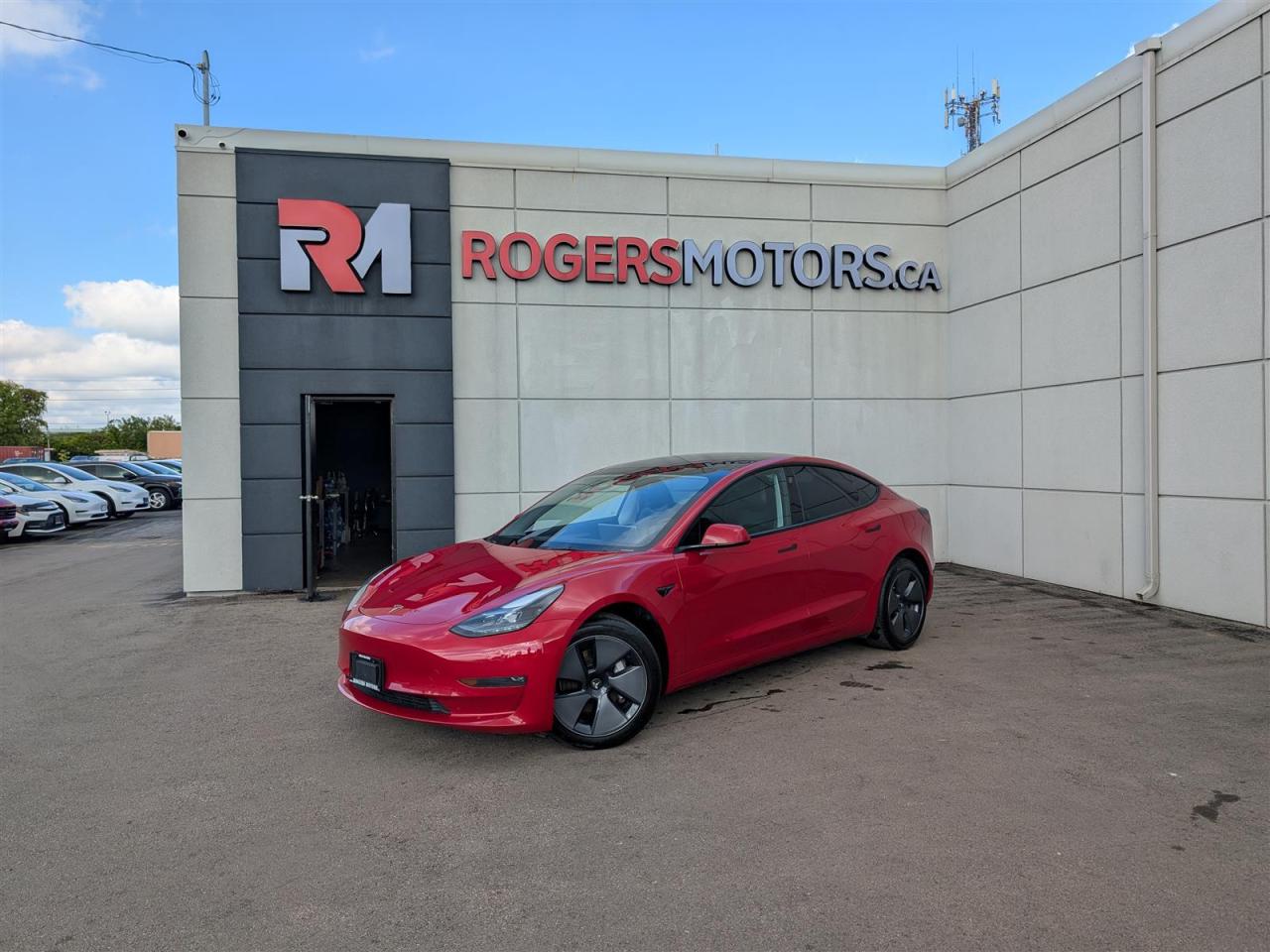 Photo of Red 2023 Tesla Model 3