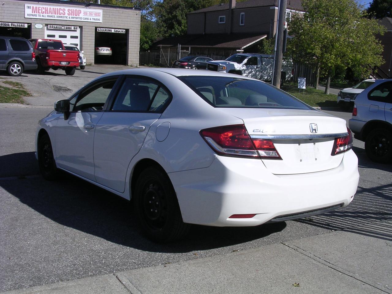 2015 Honda Civic 4dr Man LX Photo3