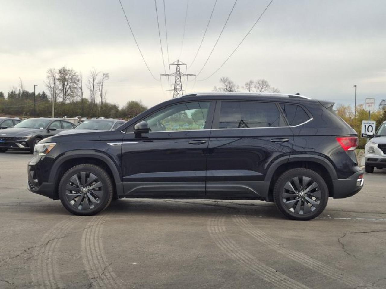 2024 Volkswagen Taos Comfortline | Panoramic Sunroof | Adaptive Cruise | Heated Wheel + Seats | CarPlay + Android | Powe Photo