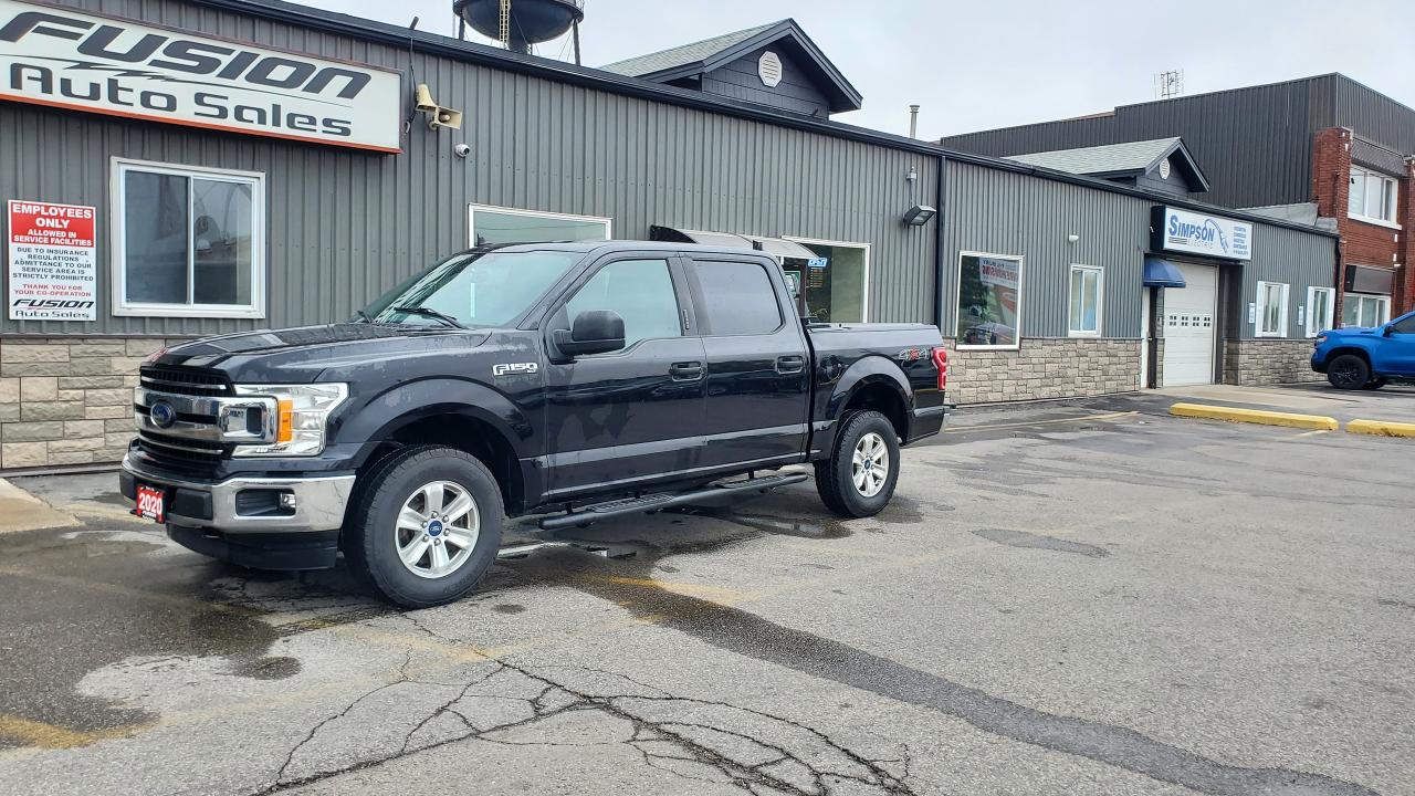 <p>3.3LV6 (non-turbo) 4x4, Full Crew Cab, Touch Screen, Back Up Camera, Bluetooth, Apply Car Play, USB Inputs, Alloy Wheels, Step Bars, Back Rack, Tow Package, Tonneau Cover with Bedliner, Lic & HST Extra.</p><p>Looking for a reliable and capable pickup truck? Check out this used 2020 Ford F-150 XLT 4WD SuperCrew, available now at Fusion Auto Sales. This rugged black beauty is ready for work or play, boasting a spacious SuperCrew cab with comfortable gray interiors, perfect for hauling the whole crew. With 153,038km on the odometer, this F-150 has plenty of life left, and its ready to take on whatever the Canadian landscape throws its way.</p><p>Under the hood, youll find a fuel-efficient 3.3L V6 engine paired with an automatic transmission, making it easy to handle both city streets and off-road adventures. This F-150 is equipped with 4-wheel drive, ready to conquer tough terrain and handle challenging weather conditions. This truck is a versatile workhorse designed to handle your everyday needs with ease. Visit Fusion Auto Sales today and see this impressive F-150 for yourself!</p><p>Here are five standout features that make this F-150 a great choice:</p><ul><li><strong>4-Wheel Drive:</strong> Conquer any road condition with confidence.</li><li><strong>Spacious SuperCrew Cab:</strong> Plenty of room for passengers and cargo.</li><li><strong>Fuel-Efficient V6 Engine:</strong> Offers a great balance of power and economy.</li><li><strong>Durable Build:</strong> A work-ready truck.</li><li><strong>Automatic Transmission:</strong> Makes for easy driving on all terrains.</li></ul><p><strong><em>Powered by AutoIntelligence™</em></strong> Vehicle information has been generated using artificial intelligence and is provided for informational purposes only. While efforts are made to ensure accuracy, please confirm all details directly with the dealer.</p><p>The Fusion Philosophy<br /><br />At Fusion Auto Sales, we put more effort into buying our vehicles than we do trying to sell them. By constantly monitoring what other car lots are doing, we strive to be the lowest priced dealer in our market. We won’t purchase a vehicle to “fill a hole”. We know that the vehicles on our lot are great value for the money and smart shoppers realize that also. Adhering to this philosophy makes it easy for our customers. If they find a vehicle on our lot that fulfills their needs and wants, they know that they’re getting great value. <br /><br />If we don’t have what you’re looking for, we can find it! Over 150 customers have saved thousands of dollars buy joining our” locate club”. People that know what they want and what they want to pay (within reason of course), get the vehicle of their dreams and enjoy huge savings. Contact us for details.<br /><br /><br /><br />Fusion Auto Sales is in Tilbury, Ont. located between Windsor and London right off the 401. We are among 7 dealerships within a &frac12; kilometer distance which is great for out of town shoppers. We began satisfying customers in 2009 and have been doing so ever since. In 2012 Fusion was recognized as 1 of the 50 fastest growing companies in Canada. And then, in 2018, we were named one of the top 5 independent automobile dealerships in the country. <br /><br />We specialize in late model vehicles at below than average pricing, everything is fully certified and every unit is Car Proof verified and is fully disclosed with every unit. We offer every type of financing from perfect credit at great rates to credit challenges with competitive rates. We also specialize in locating vehicles for customers, we cant have everything on the lot so if you do not see it and are having a hard time finding what you are looking for, let us know and we can find it for you. Fusion Auto Sales spans its customer base from Windsor all the way to Timmins, On and every where in between. Our philosophy is You are going to like the way we deal and everyone does, straight honest answers with no monkey business and no back and forth between sales and managers.</p>