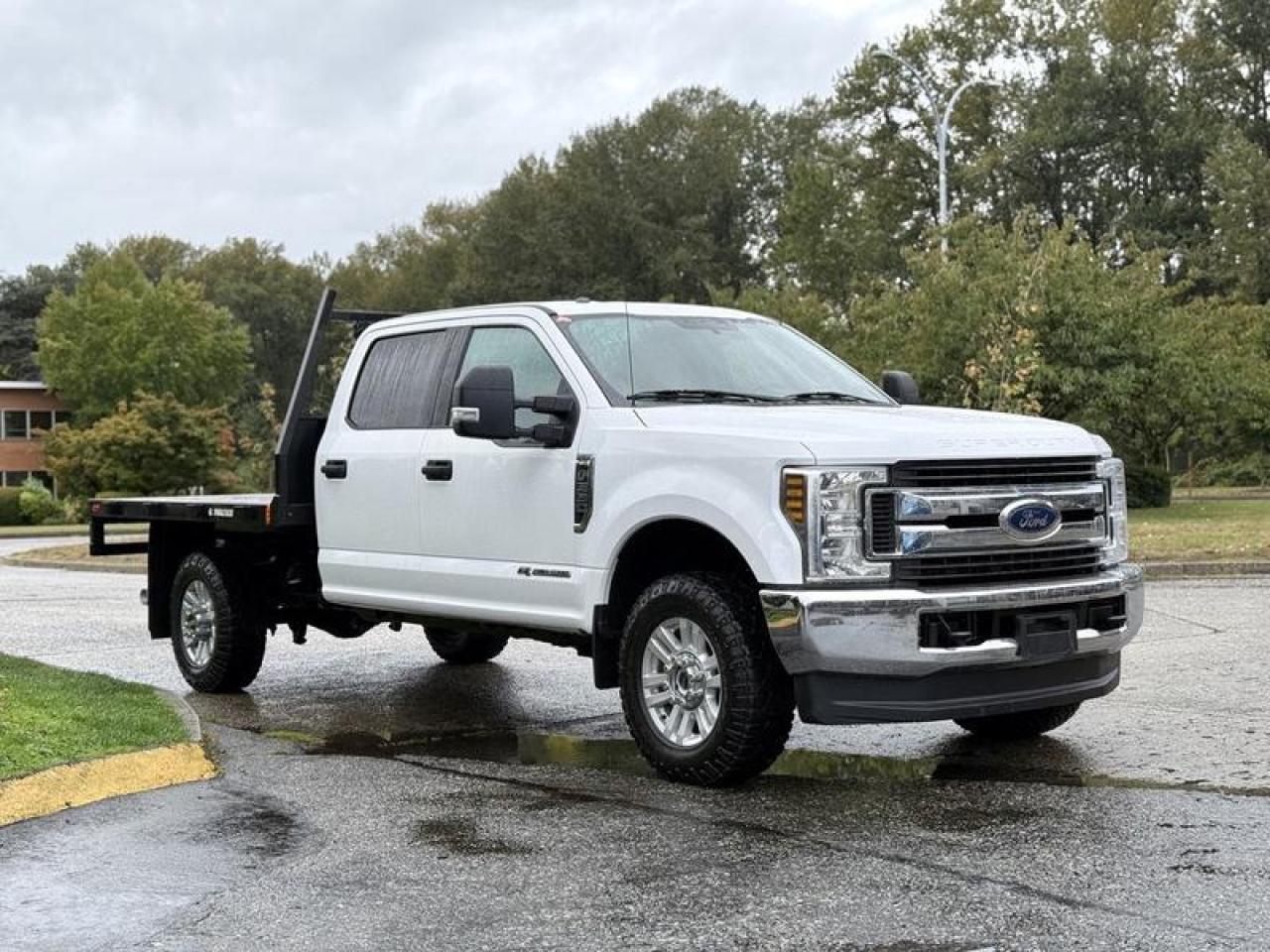 Used 2019 Ford F-350 SD XLT 4x4 Crew Cab Diesel with 8-Foot Flat Deck for sale in Burnaby, BC
