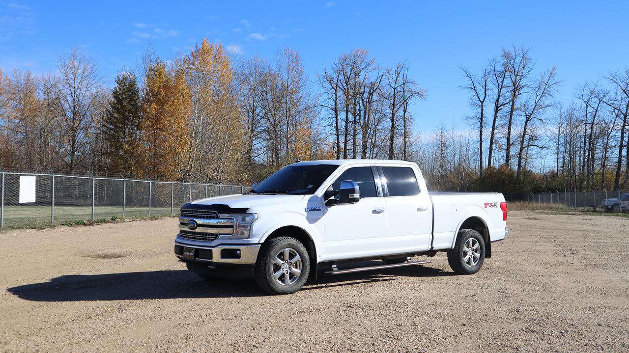 <p data-start=192 data-end=235><span style=font-size: 18pt;><strong data-start=192 data-end=233>2020 Ford F-150 Lariat (Oxford White)</strong></span></p><p data-start=237 data-end=665>The 2020 Ford F-150 Lariat blends strength, technology, and premium comfort into one of Ford&rsquo;s most refined trucks. Dressed in <strong data-start=364 data-end=380>Oxford White</strong> with a <strong data-start=388 data-end=405>chrome grille</strong>, <strong data-start=407 data-end=432>body-coloured accents</strong>, and <strong data-start=438 data-end=457>LED brakelights</strong>, it delivers a commanding presence that&rsquo;s both rugged and upscale. The <strong data-start=529 data-end=550>deep-tinted glass</strong>, <strong data-start=552 data-end=575>chrome step bumpers</strong>, and <strong data-start=581 data-end=622>cargo lamp with high-mount stop light</strong> add to its confident, functional design.</p><p data-start=667 data-end=1162>Inside, the Lariat offers a refined interior with <strong data-start=717 data-end=745>leather-trimmed surfaces</strong>, <strong data-start=747 data-end=802>voice-activated dual-zone automatic climate control</strong>, and a <strong data-start=810 data-end=847>leather/metal-look steering wheel</strong>. Drivers enjoy <strong data-start=863 data-end=890>power-adjustable pedals</strong>, <strong data-start=892 data-end=926>a 4.2&rdquo; LCD productivity screen</strong>, <strong data-start=928 data-end=965>FordPass Connect 4G Wi-Fi hotspot</strong>, and <strong data-start=971 data-end=1001>dual 120V AC power outlets</strong> for convenience on the go. The <strong data-start=1033 data-end=1072>60/40 split-folding rear bench seat</strong>, <strong data-start=1074 data-end=1097>ample cabin storage</strong>, and <strong data-start=1103 data-end=1125>full floor console</strong> ensure practicality meets comfort.</p><p data-start=1164 data-end=1567>Safety and driver assistance are top priorities, featuring <strong data-start=1223 data-end=1244>Ford Co-Pilot360&trade;</strong> with <strong data-start=1250 data-end=1312>Pre-Collision Assist and Automatic Emergency Braking (AEB)</strong>, <strong data-start=1314 data-end=1354>Blind Spot Information System (BLIS)</strong>, <strong data-start=1356 data-end=1379>Cross-Traffic Alert</strong>, and <strong data-start=1385 data-end=1412>Driver Monitoring Alert</strong>. Additional systems like <strong data-start=1438 data-end=1447>MyKey</strong>, <strong data-start=1449 data-end=1474>Safety Canopy airbags</strong>, and <strong data-start=1480 data-end=1521>Securilock Anti-Theft Ignition (PATS)</strong> further enhance security and peace of mind.</p><p data-start=1569 data-end=1978>Under the hood, the Lariat is built for performance with <strong data-start=1626 data-end=1656>automatic four-wheel drive</strong>, <strong data-start=1658 data-end=1686>electronic transfer case</strong>, <strong data-start=1688 data-end=1717>Pro Trailer Backup Assist</strong>, and <strong data-start=1723 data-end=1758>Class IV trailer hitch receiver</strong> with smart trailer tow connector. A <strong data-start=1795 data-end=1814>3.31 axle ratio</strong>, <strong data-start=1816 data-end=1845>HD gas-pressurized shocks</strong>, and <strong data-start=1851 data-end=1888>solid rear axle with leaf springs</strong> deliver a smooth, capable ride whether you&rsquo;re towing, hauling, or cruising the highway.</p><p data-start=1980 data-end=2149>With its premium features, advanced safety technology, and Ford&rsquo;s legendary toughness, the 2020 F-150 Lariat stands as a perfect balance between luxury and capability.</p><p>&nbsp;</p>