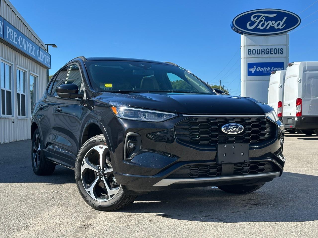 <p>The 2025 Ford Escape ST-Line Elite AWD in stunning black delivers an impressive all-wheel-drive performance, perfect for handling any Canadian road condition with confidence and ease.</p><p>The bold and refined exterior seamlessly complements the stylish black interior, designed to provide both comfort and sophistication. Enjoy the premium feel as you relax in quality seating with heated front seats, while the panoramic moonroof adds a touch of luxury. This SUV features striking alloy wheels and gives you the convenience of a power liftgate.</p><p>Modern technology takes center stage in this Escape, equipped with an intuitive multimedia system including smart device integration and a satellite radio to keep you connected on every journey. Safety is prioritized with an array of features such as a backup camera, brake assist, lane assist, and adaptive cruise control, ensuring peace of mind for driver and passengers alike.</p><p>Whether you're an adventurous family or a professional seeking a reliable and stylish vehicle, the Ford Escape ST-Line Elite AWD is crafted to meet your needs. Experience unmatched comfort on the go and reach out to our dealership today for more details and to schedule a test drive.</p>