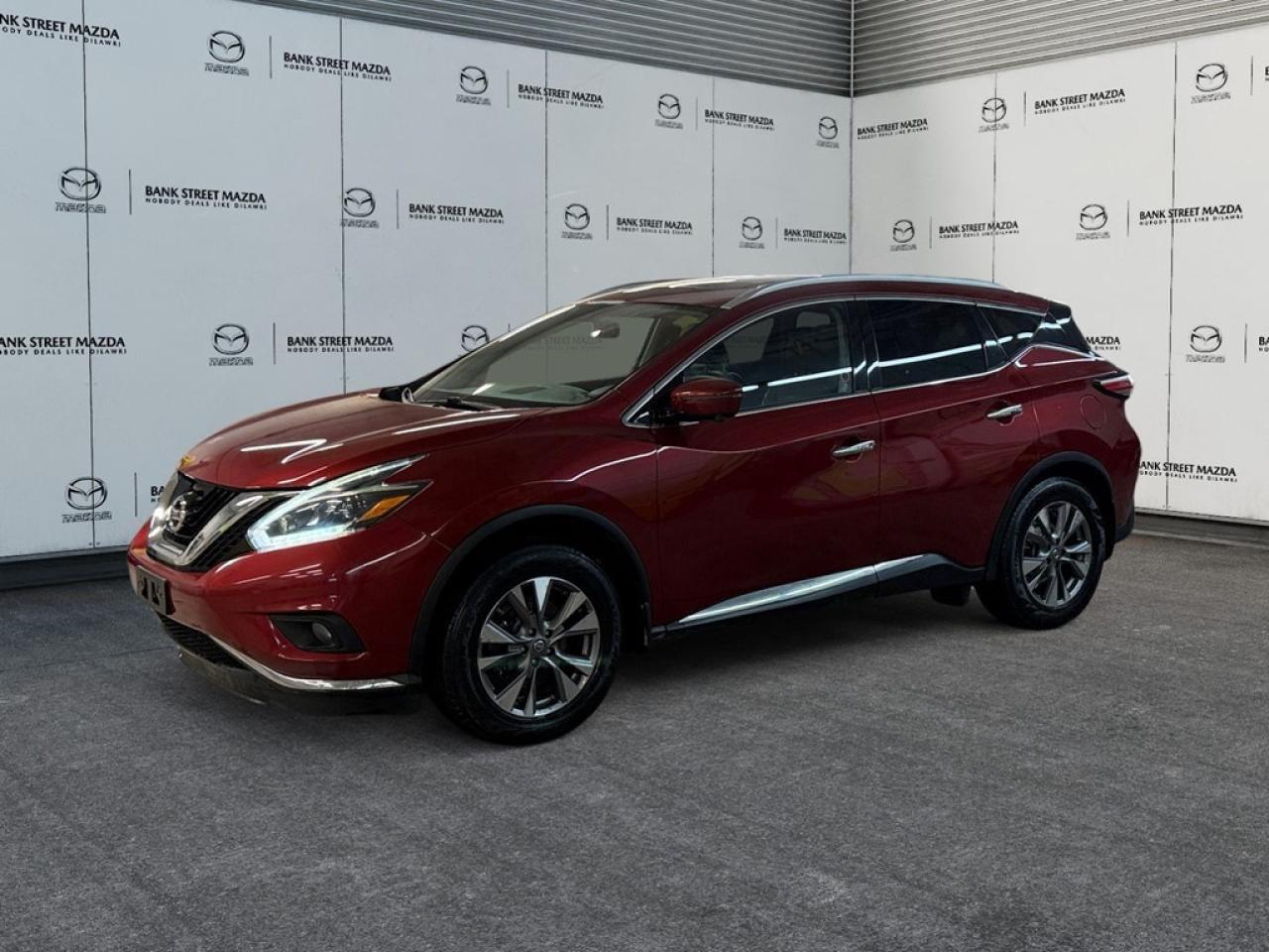 The 2018 Nissan Murano AWD SL in vibrant red, with its all-wheel drive, promises a confident handling experience whatever the conditions. This SUV fits seamlessly into both urban landscapes and off-the-beaten-path adventures with its 3.5L 6-cylinder engine coupled with an automatic transmission. On the exterior, stylish alloy wheels complement its bold color, while the sunroof enhances its sophisticated appeal. Inside, this Murano offers a luxurious ride, featuring heated seats that ensure comfort and a navigation system to keep you heading in the right direction. Smart device integration, a bluetooth connection, and satellite radio cover all your entertainment needs. Safety and technology are at the forefront with a backup camera for easy and safe reversing, brake assist, and cruise control for a smoother drive. Keyless entry, remote start, and power windows add further convenience, making your drive utterly effortless. Perfect for families seeking a reliable and stylish companion, this SUV could be your next favorite ride. Contact our dealership for more details and to secure a test drive today!