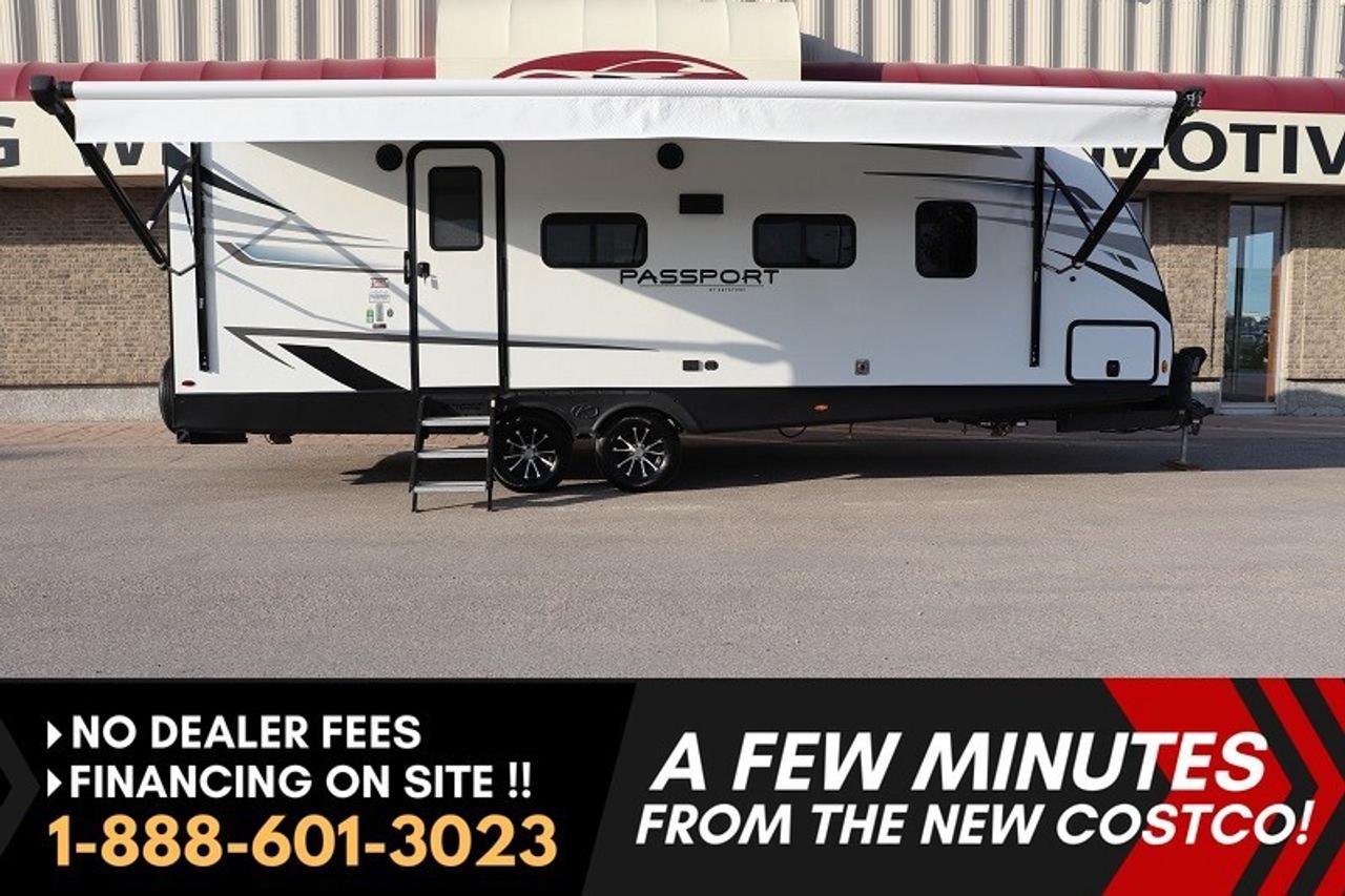*** Dealer arranged financing on site! Quick, Simple,  no calls or waiting on bank appointments required!! ***   NO ADMINISTRATION FEES!!

***WOW WHAT A TRAILER DO NOT MISS OUT*** COUPLES  DREAM CAMPER*** INCREDIBLE LAYOUT WITH REAR BATHROOM !!! AMAZING DEAL**** 

EXTREMELY CLEAN, STILL AS NEW!! VERY LIGHT USE TRAILER IN AMAZING CONDITION! VERY MODERN, BRIGHT AND FUNCTIONAL CAMPER, COME DOWN AND SEE IT TODAY!! DO NOT HESITATE THIS UNIQUE TRAILER WILL NOT LAST LONG AT ALL!!! 2022  KEYSTONE PASSPORT GRAND 2400 RB . This is a VERY unique and amazing trailer!! Outdoor activity, and inside comforts are steps away in this 2022 KEYSTONE PASSPORT 2400RB SUV towable weighing only 5725lbs dry weight.

Key Highlights:
- Length 29 feet  
- Dry weight: only 5,725 lbs (SUV-towable)
- Hitch weight: 635 lbs
- Spacious living room slide
- Front private bedroom with queen bed
- Full rear bathroom with dual vanity sinks
- Double recliners that convert for dining
- Entertainment center with fireplace
- Modern kitchen with solid-surface countertops & farmhouse sink
- Heated & enclosed underbelly &ndash; extended season camping
- Power tongue jack & power stabilizer jacks
- Power awning with LED light strip
- Solid entry steps & tons of storage
- Outside kitchen + outside shower (hot & cold)
- Solar & inverter prep + backup camera prep
- 15,000 BTU A/C + 30,000 BTU furnace
- KeyTV&trade; multi-source signal controller (satellite/cable integration)
- 4G LTE & WiFi prep
- 43 gallon fresh water tank
- 114 gallon grey/black storage tanks
- 6 gallon water heater

Why You&rsquo;ll Love It
This Passport is more like a modern second home on wheels than a camper. After a day of hiking or biking, relax in the spacious living area, enjoy the warmth of the fireplace, or cook a meal inside or outside. The large rear bath with dual sinks is a rare find in this class of trailer.


***EXTENDED WARRANTY options available to choose from to protect your RV and your wallet. (HUGE VALUE!!!) Zero down financing OAC with very Low monthly payments avail. Please see dealer for details. Trades accepted. View at Winnipeg West Automotive Group, 5195 Portage Ave. Dealer permit # 4365, Call now 1-(888) 601-3023.