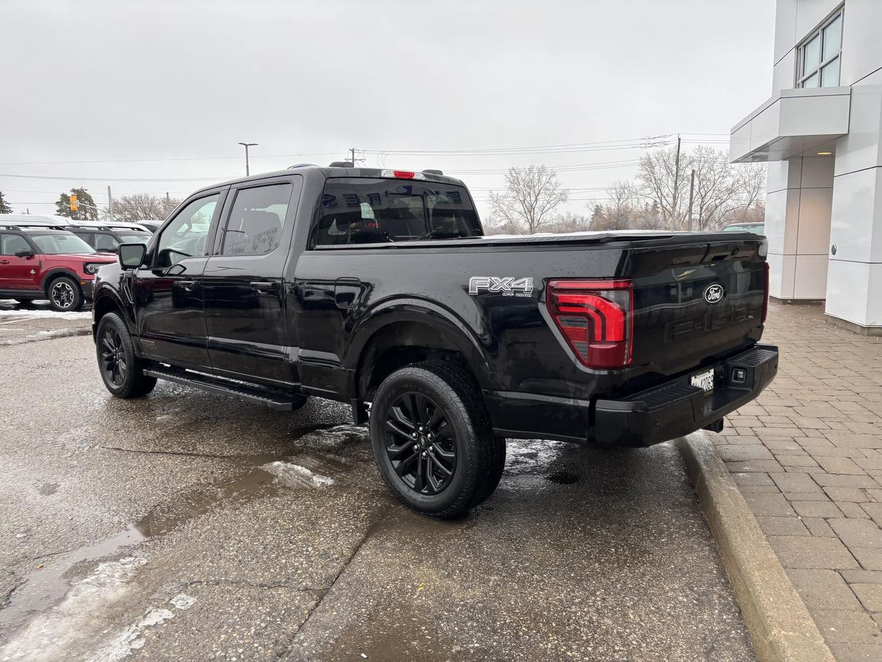 2025 Ford F-150 LARIAT 502A, 3.5LHEV, ROOF, BLACK PACKAGE, 20"RIMS Photo