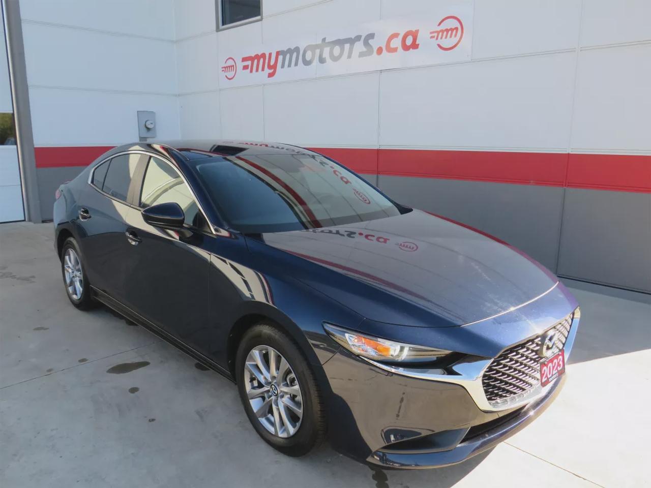2023 Mazda MAZDA3 GX  | Clean Title | No Accidents | Safety Certified | Alloy Rims | Push Button Start | Reverse Camera | Heated Seats | Sport Mode | Traction Control | Bluetooth | Cruise Control Photo
