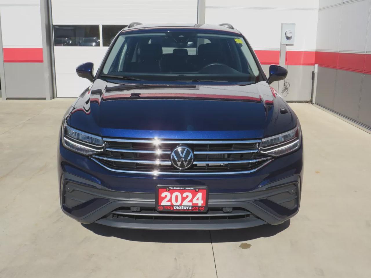 2024 Volkswagen Tiguan Comfortline  | Low Km | Clean Title | No Accidents | Safety Certified | AWD | Alloy Rims | Leather | Remote Start | Power Seats | Power Tailgate | Digital Touchscreen | Drive Modes | Heated Seats | Push Button Start | Dual Climate Control | Rear Camera Photo