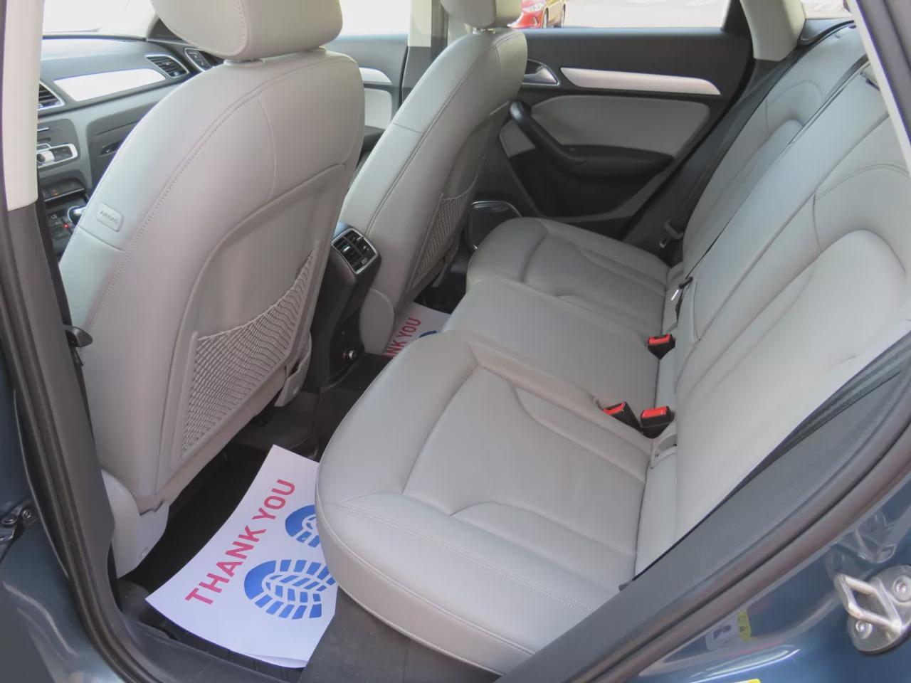 2016 Audi Q3 Technik  | Clean Title | No Accidents | Safety Certified | AWD | Alloy Rims | Leather | Navigation | Sunroof | Power Seats | Push Button Start | Dual Climate Control | CDPlayer | Heated Seats | Rear Privacy Cover | Power Tailgate | Bluetooth Photo