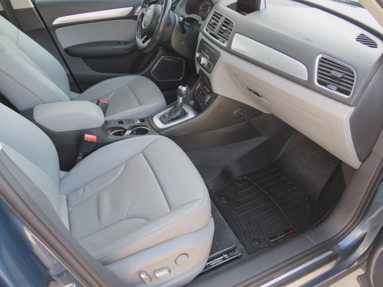 2016 Audi Q3 Technik  | Clean Title | No Accidents | Safety Certified | AWD | Alloy Rims | Leather | Navigation | Sunroof | Power Seats | Push Button Start | Dual Climate Control | CDPlayer | Heated Seats | Rear Privacy Cover | Power Tailgate | Bluetooth Photo