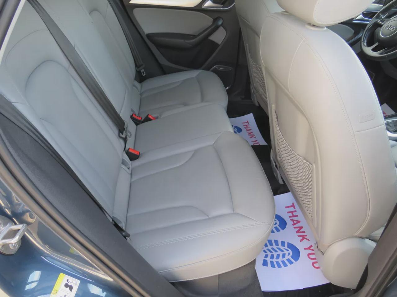 2016 Audi Q3 Technik  | Clean Title | No Accidents | Safety Certified | AWD | Alloy Rims | Leather | Navigation | Sunroof | Power Seats | Push Button Start | Dual Climate Control | CDPlayer | Heated Seats | Rear Privacy Cover | Power Tailgate | Bluetooth Photo