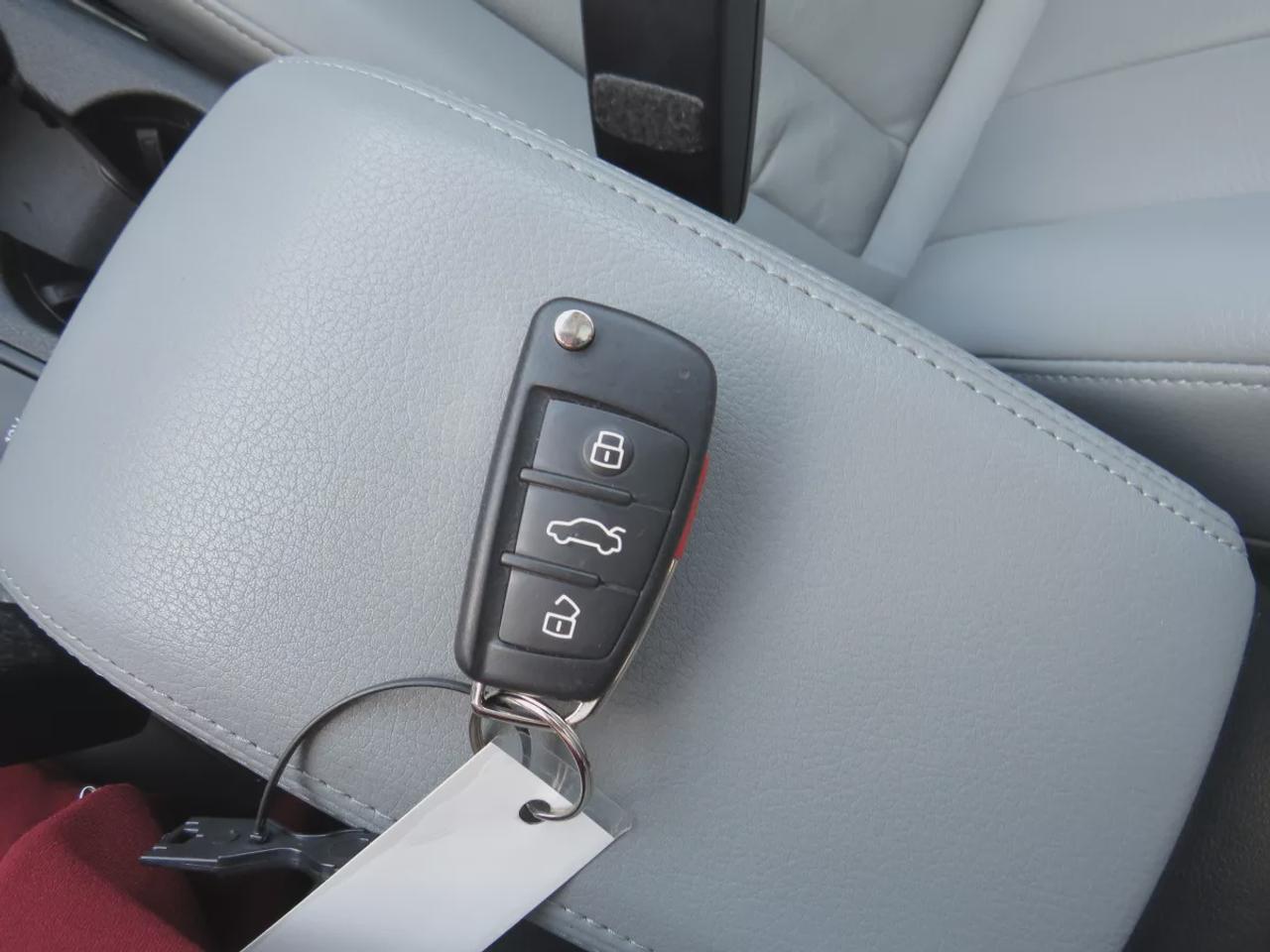2016 Audi Q3 Technik  | Clean Title | No Accidents | Safety Certified | AWD | Alloy Rims | Leather | Navigation | Sunroof | Power Seats | Push Button Start | Dual Climate Control | CDPlayer | Heated Seats | Rear Privacy Cover | Power Tailgate | Bluetooth Photo