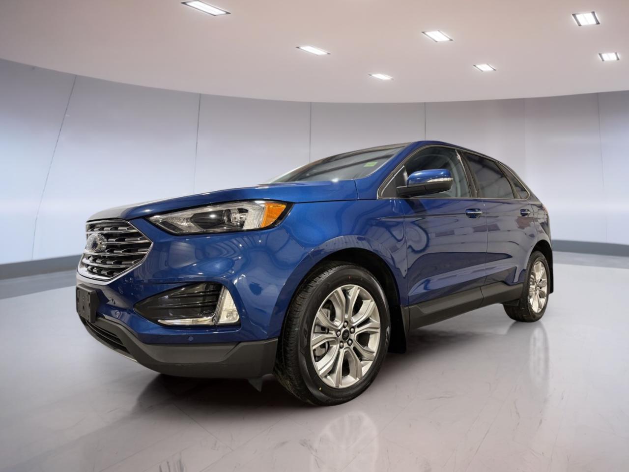 Experience refined versatility and advanced technology with the 2024 Ford Edge Titanium, now available at Moose Jaw Honda in Moose Jaw. This used model stands out with its striking blue exterior and impressive all-wheel drive capability, making it an excellent choice for Saskatchewans diverse driving conditions. With only 62,355 km on the odometer, this Edge Titanium combines reliability, comfort, and performance for your daily commute or weekend adventures.

FEATURES OF THE Edge Titanium  
»» Twin-scroll 2.0L EcoBoost engine for dynamic power  
»» 8-speed automatic transmission for seamless shifting  
»» All-wheel drive for enhanced traction and control  
»» Distinctive blue exterior for standout style  

ADVANCED SAFETY FEATURES  
»» Blind spot monitoring for safer lane changes  
»» Rearview camera for confident reversing  
»» Lane keeping assist for added security  
»» Pre-collision assist with automatic emergency braking  

PERFORMANCE AND EFFICIENCY  
»» Turbocharged 2.0L EcoBoost engine delivers efficiency  
»» 8-speed automatic transmission ensures smooth driving  
»» All-wheel drive adapts to changing road conditions  
»» Responsive handling for city and highway travel  

COMFORT AND CONVENIENCE  
»» Dual-zone automatic climate control for personalized comfort  
»» Power-adjustable front seats for easy customization  
»» Heated front seats for cold weather comfort  
»» Ample rear legroom for passenger enjoyment  

TECHNOLOGY AND CONNECTIVITY  
»» Touchscreen infotainment system with intuitive controls  
»» Bluetooth connectivity for hands-free calling  
»» Apple CarPlay and Android Auto compatibility  
»» Premium sound system for immersive audio  

CARGO SPACE  
»» Spacious rear cargo area for daily needs  
»» Split-folding rear seats for flexible storage  
»» Low lift-over height for easy loading  
»» Multiple storage compartments for convenience  

WHAT OTHER OWNERS LIKE  
»» Smooth and quiet ride quality  
»» User-friendly infotainment system  
»» Confident all-wheel drive performance  
»» Comfortable seating for long journeys  

This 2024 Ford Edge Titaniums VIN is: 2FMPK4K94RBA99117.<p> now available at Moose Jaw Honda in Moose Jaw. This used model stands out with its striking blue exterior and impressive all-wheel drive capability</p>
<p> and performance for your daily commute or weekend adventures.

FEATURES OF THE Edge Titanium  
»» Twin-scroll 2.0L EcoBoost engine for dynamic power  
»» 8-speed automatic transmission for seamless shifting  
»» All-wheel drive for enhanced traction and control  
»» Distinctive blue exterior for standout style  

ADVANCED SAFETY FEATURES  
»» Blind spot monitoring for safer lane changes  
»» Rearview camera for confident reversing  
»» Lane keeping assist for added security  
»» Pre-collision assist with automatic emergency braking  

PERFORMANCE AND EFFICIENCY  
»» Turbocharged 2.0L EcoBoost engine delivers efficiency  
»» 8-speed automatic transmission ensures smooth driving  
»» All-wheel drive adapts to changing road conditions  
»» Responsive handling for city and highway travel  

COMFORT AND CONVENIENCE  
»» Dual-zone automatic climate control for personalized comfort  
»» Power-adjustable front seats for easy customization  
»» Heated front seats for cold weather comfort  
»» Ample rear legroom for passenger enjoyment  

TECHNOLOGY AND CONNECTIVITY  
»» Touchscreen infotainment system with intuitive controls  
»» Bluetooth connectivity for hands-free calling  
»» Apple CarPlay and Android Auto compatibility  
»» Premium sound system for immersive audio  

CARGO SPACE  
»» Spacious rear cargo area for daily needs  
»» Split-folding rear seats for flexible storage  
»» Low lift-over height for easy loading  
»» Multiple storage compartments for convenience  

WHAT OTHER OWNERS LIKE  
»» Smooth and quiet ride quality  
»» User-friendly infotainment system  
»» Confident all-wheel drive performance  
»» Comfortable seating for long journeys  

This 2024 Ford Edge Titaniums VIN is: 2FMPK4K94RBA99117.</p>