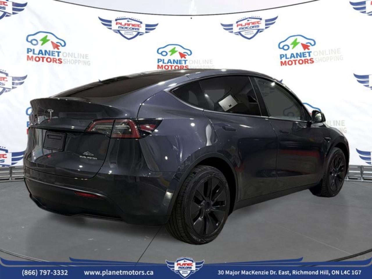 2025 Tesla Model Y Long Range AWD - Photo #5