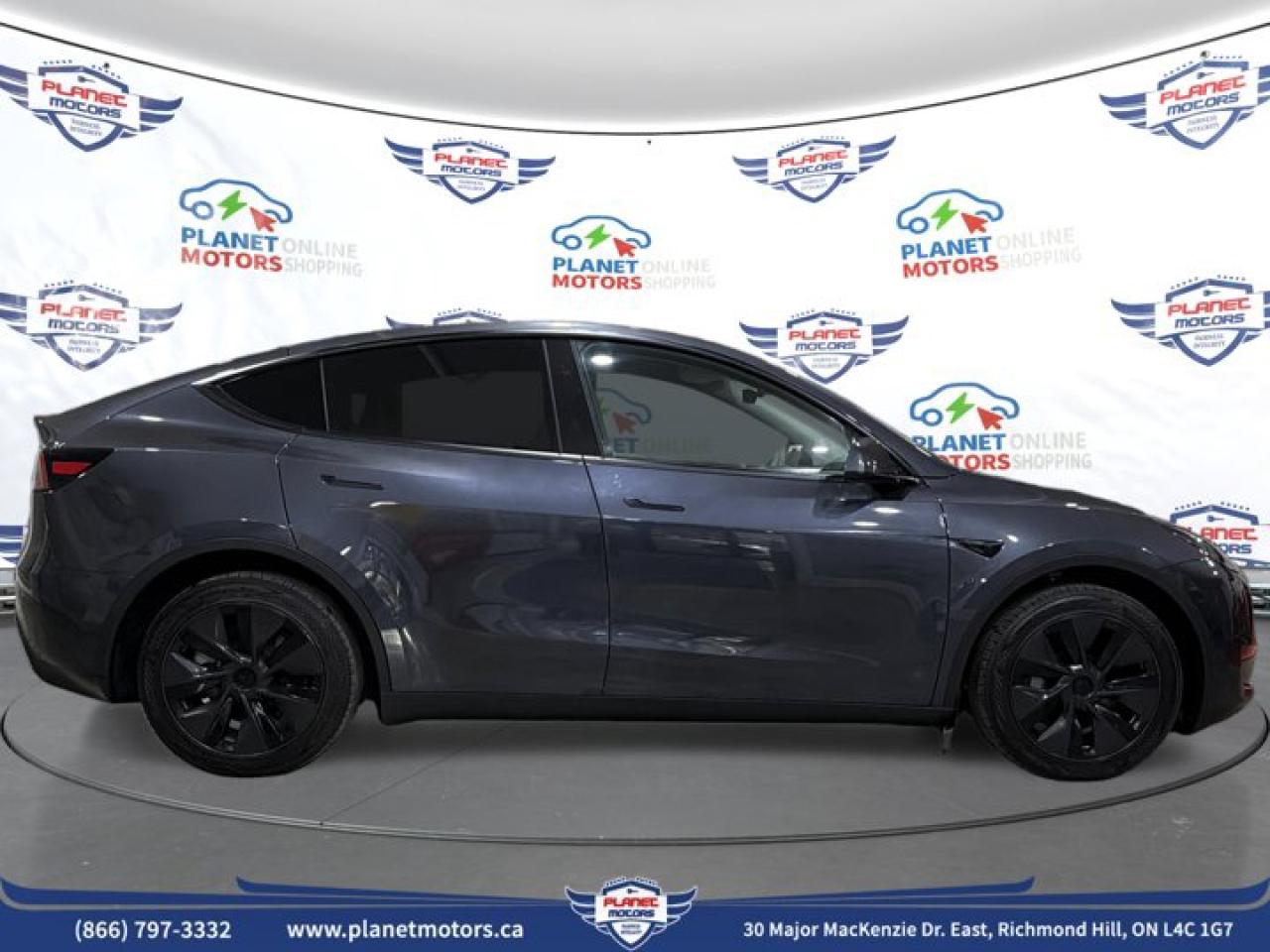 2025 Tesla Model Y Long Range AWD Photo3