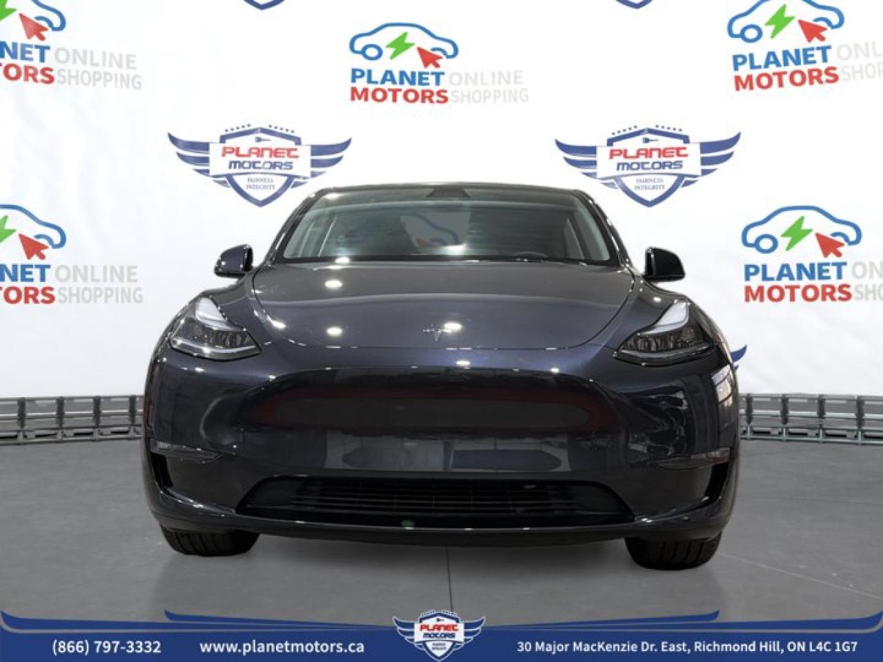 2025 Tesla Model Y Long Range AWD - Photo #2