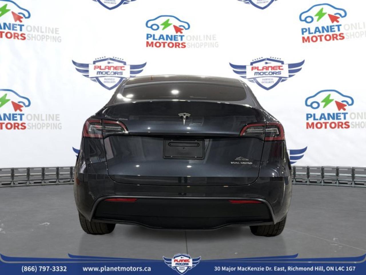 2025 Tesla Model Y Long Range AWD - Photo #6
