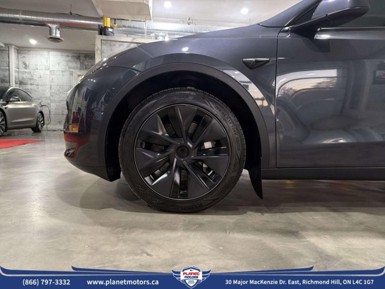 2025 Tesla Model Y Long Range AWD - Photo #10